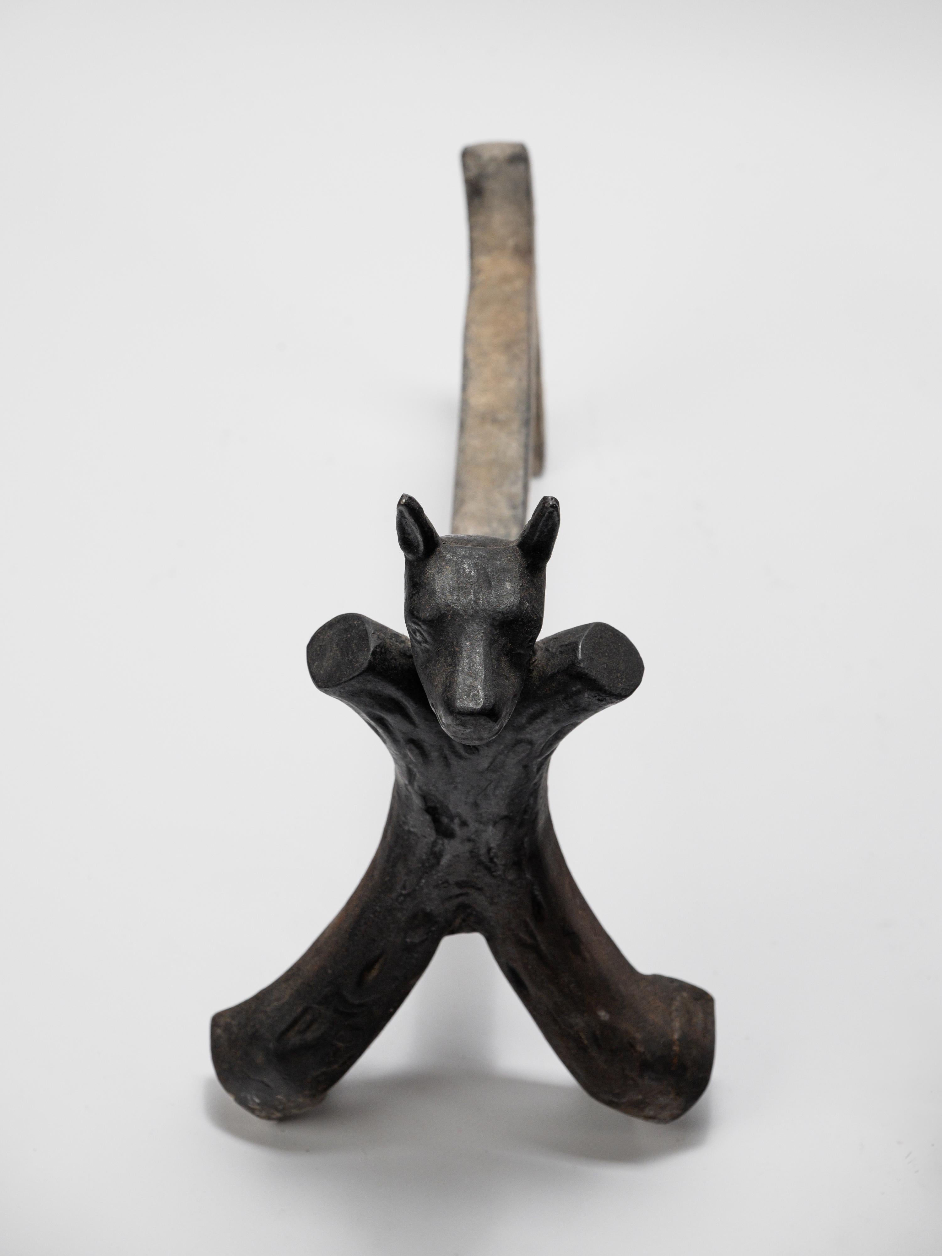 Iron Striking pair of French wrought iron andirons from the 1950s For Sale