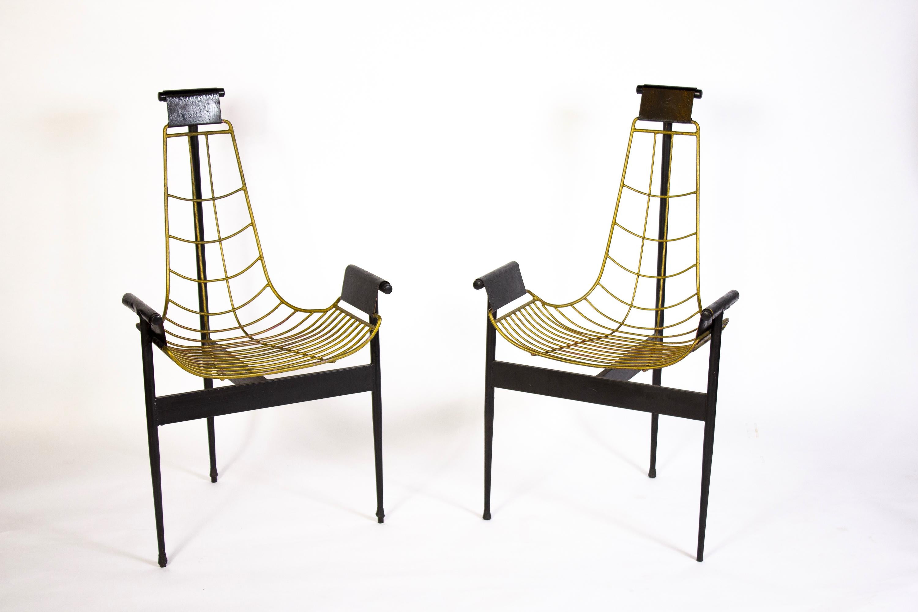 William Katavolos in partnership with Douglas Kelley & Ross Littell designed the iconic sling-back T chair in 1952 as model 3LC in Laverne International's sculptural New Furniture series. 
Frame of Black lacquered tubular steel and gold painted