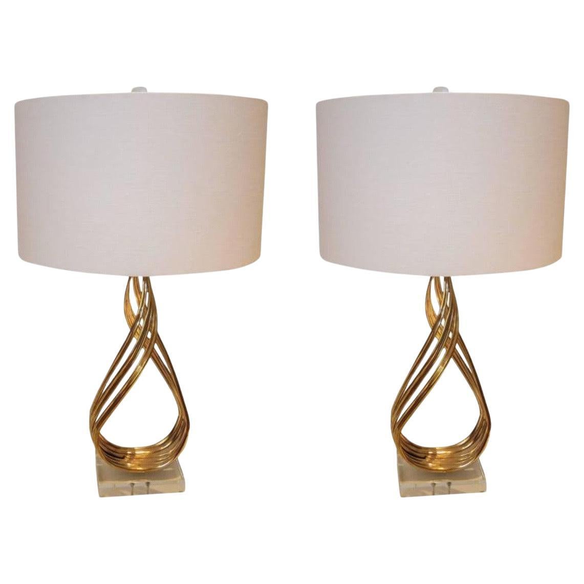 Striking Pair of Patinated Twisted Bronze and Lucite Tall Sculpted Lamps For Sale