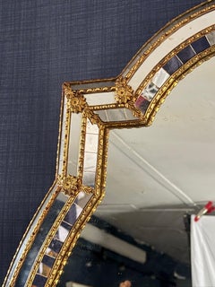 Striking Pair of Venetian/Hollywood Regency Style Shield Shaped Mirrors