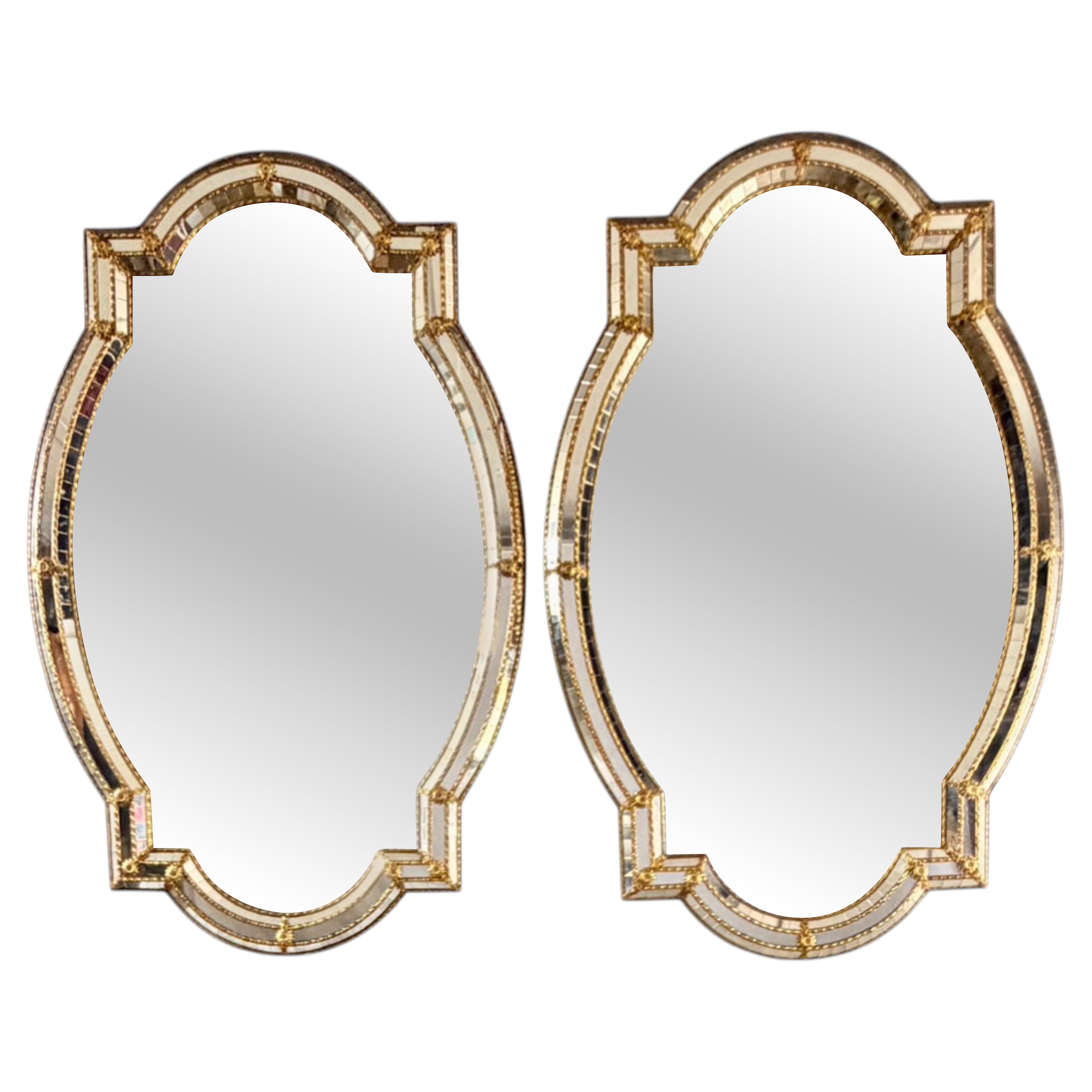 Striking Pair of Venetian/Hollywood Regency Style Shield Shaped Mirrors