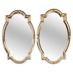 Striking Pair of Venetian/Hollywood Regency Style Shield Shaped Mirrors