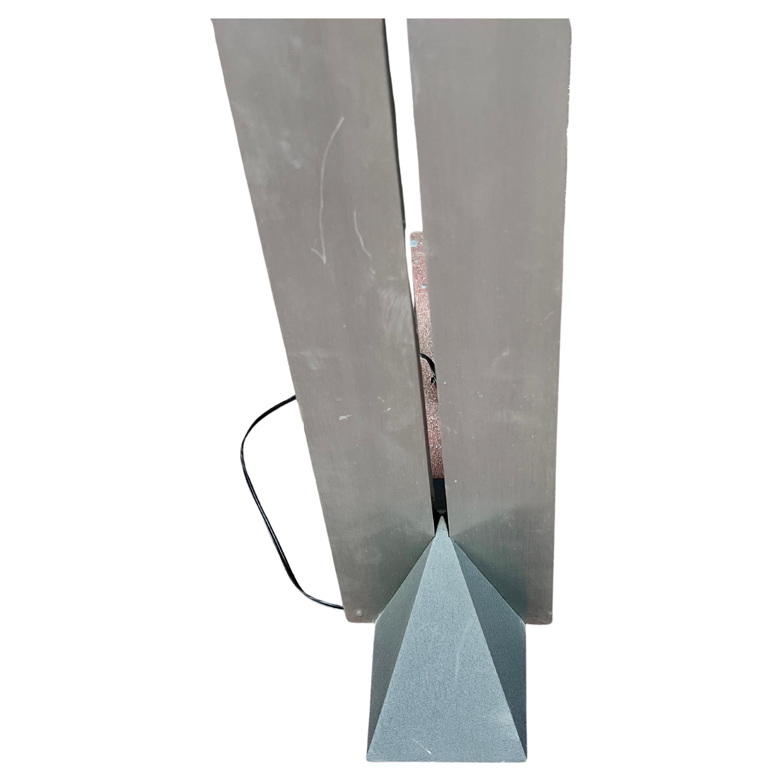 Post-Modern Striking Polished Stainless Steel Torchiere Floor Lamp Designed by Sonneman For Sale