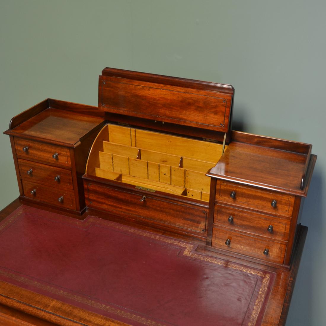 Striking Quality Victorian mahogany Bonheur Du Jour writing desk

In the Gillows design and of superb quality, this stunning writing desk dates from around 1880 and has a central lift up lid with stationary compartment, key with working lock