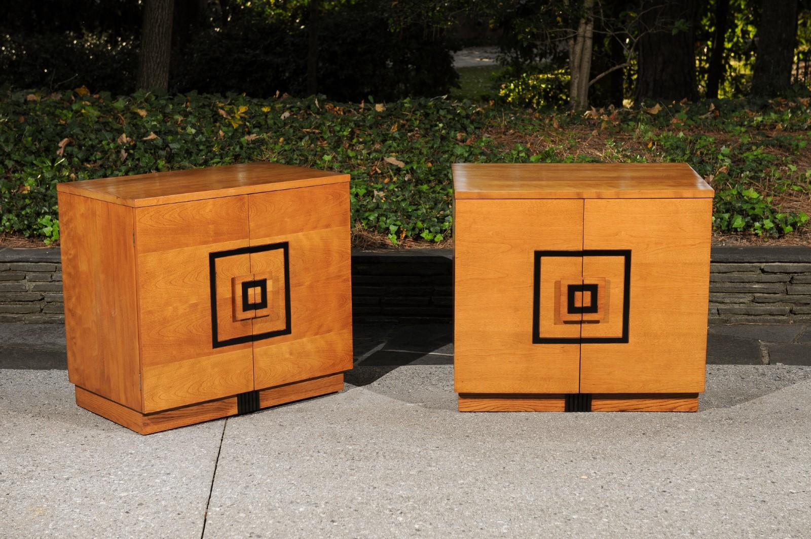 These magnificent commodes are shipped as professionally photographed and described in the listing narrative: Meticulously professionally restored and completely installation ready.

A stunning pair of Art Deco cabinets by John Stuart, circa 1940.