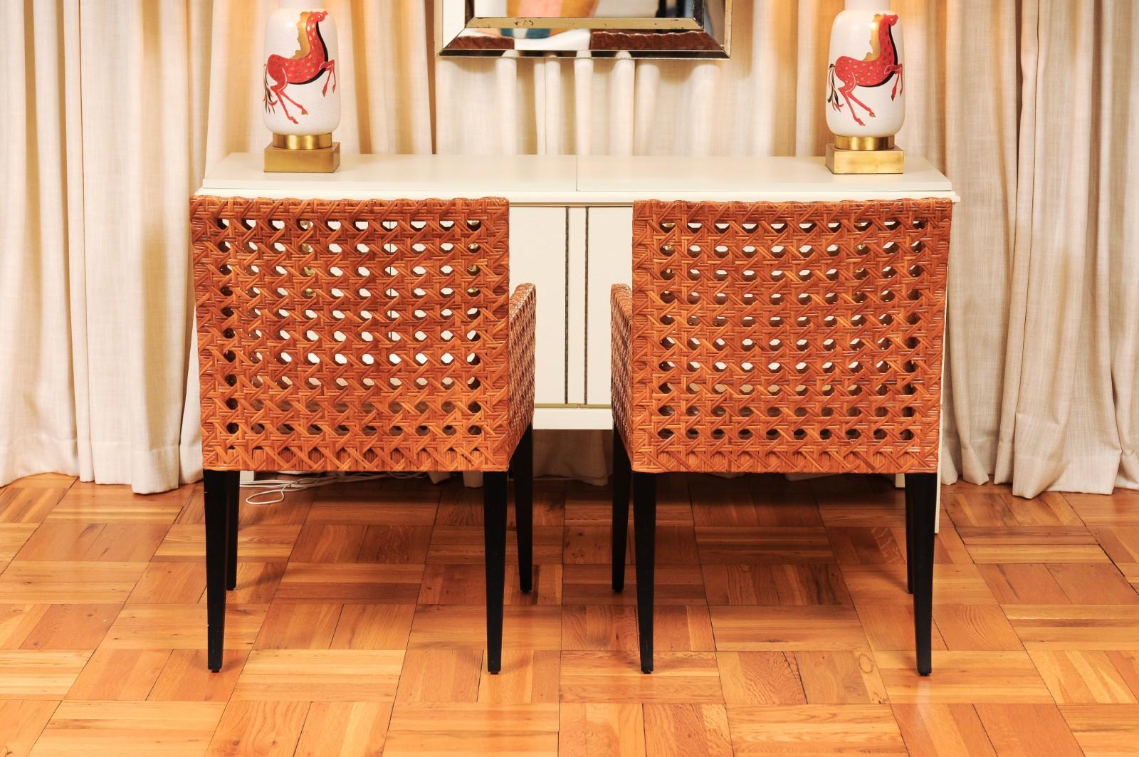 Striking Restored Set of 8 Vintage Caramel Cane and Black Lacquer Arm Chairs For Sale 4
