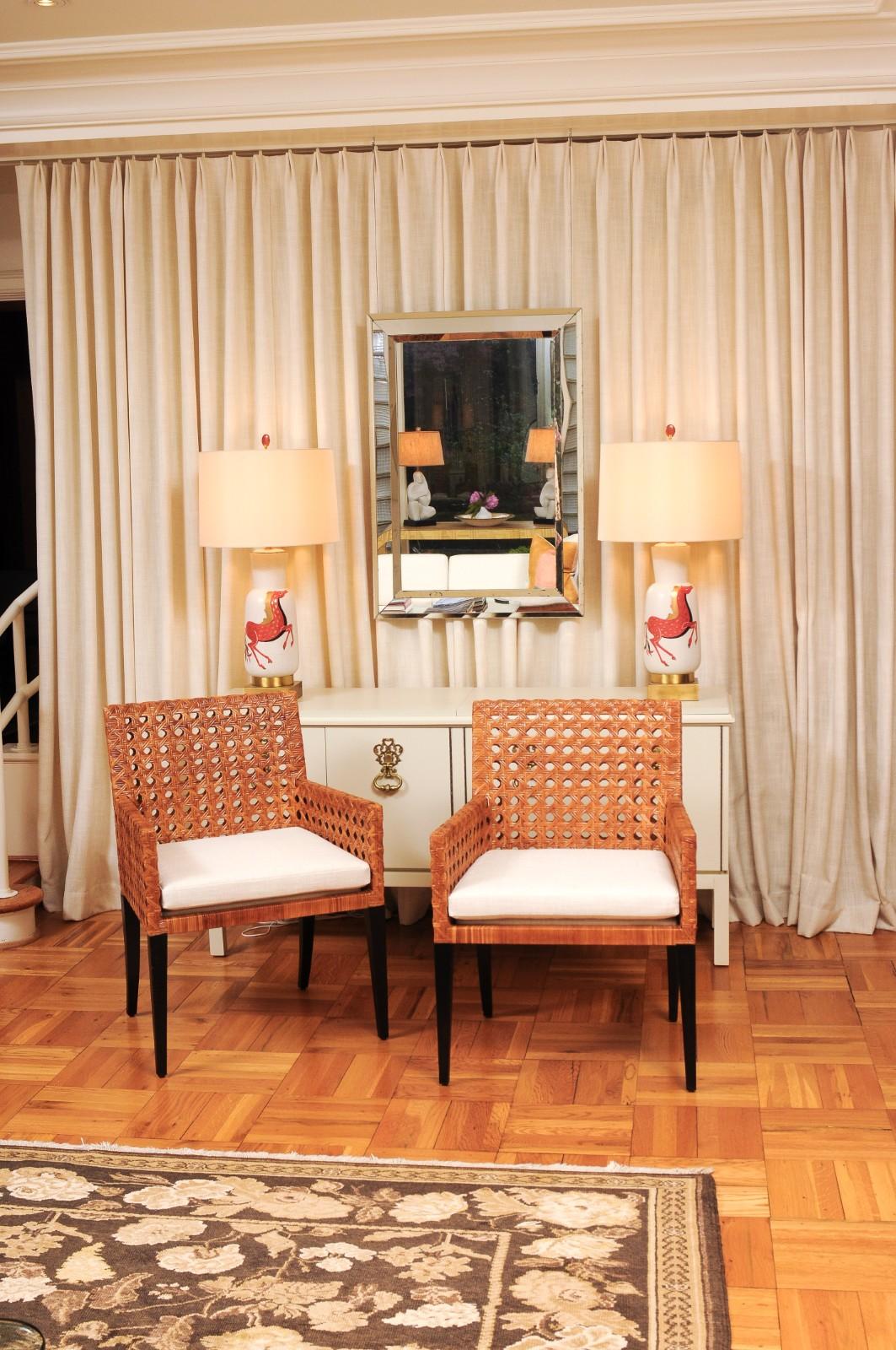 Striking Restored Set of 8 Vintage Caramel Cane and Black Lacquer Arm Chairs In Excellent Condition For Sale In Atlanta, GA