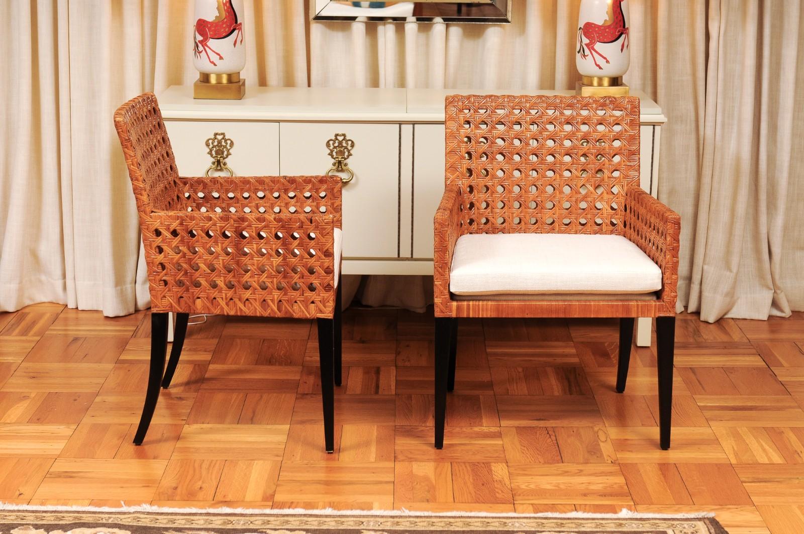 Striking Restored Set of 8 Vintage Caramel Cane and Black Lacquer Arm Chairs For Sale 1