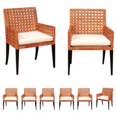 Remarquable ensemble restauré de 8 fauteuils vintage en rotin caramel et laque noire