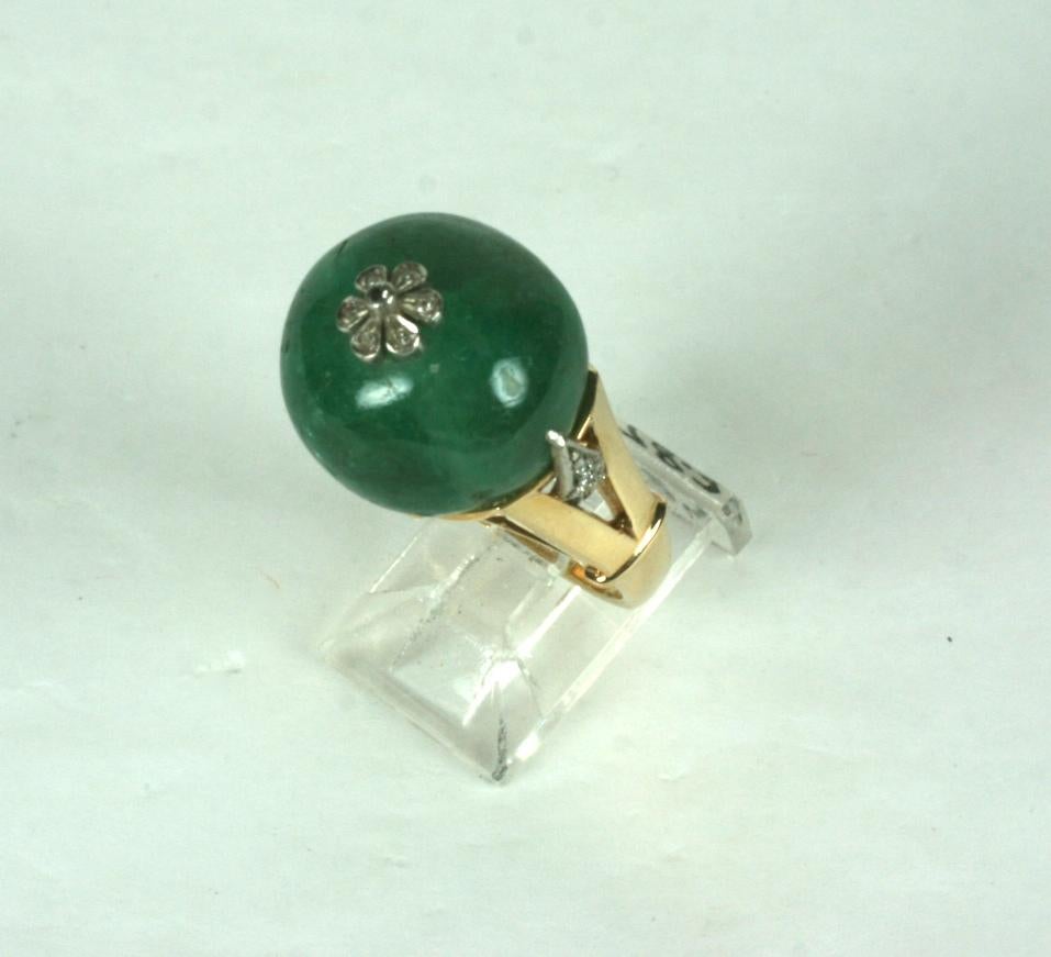 Striking large Retro Emerald Bead and Diamond Ring from the late 1930's. Wonderful mount in 14k gold with cool diamond pave claw detailing. Massive tumbled natural emerald bead (likely antique Indian) is set with a diamond set floret.  1930's