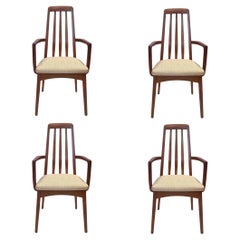 Striking Set of 4 Arm dining Chairs in Teak by Benny Linden New Upholstery