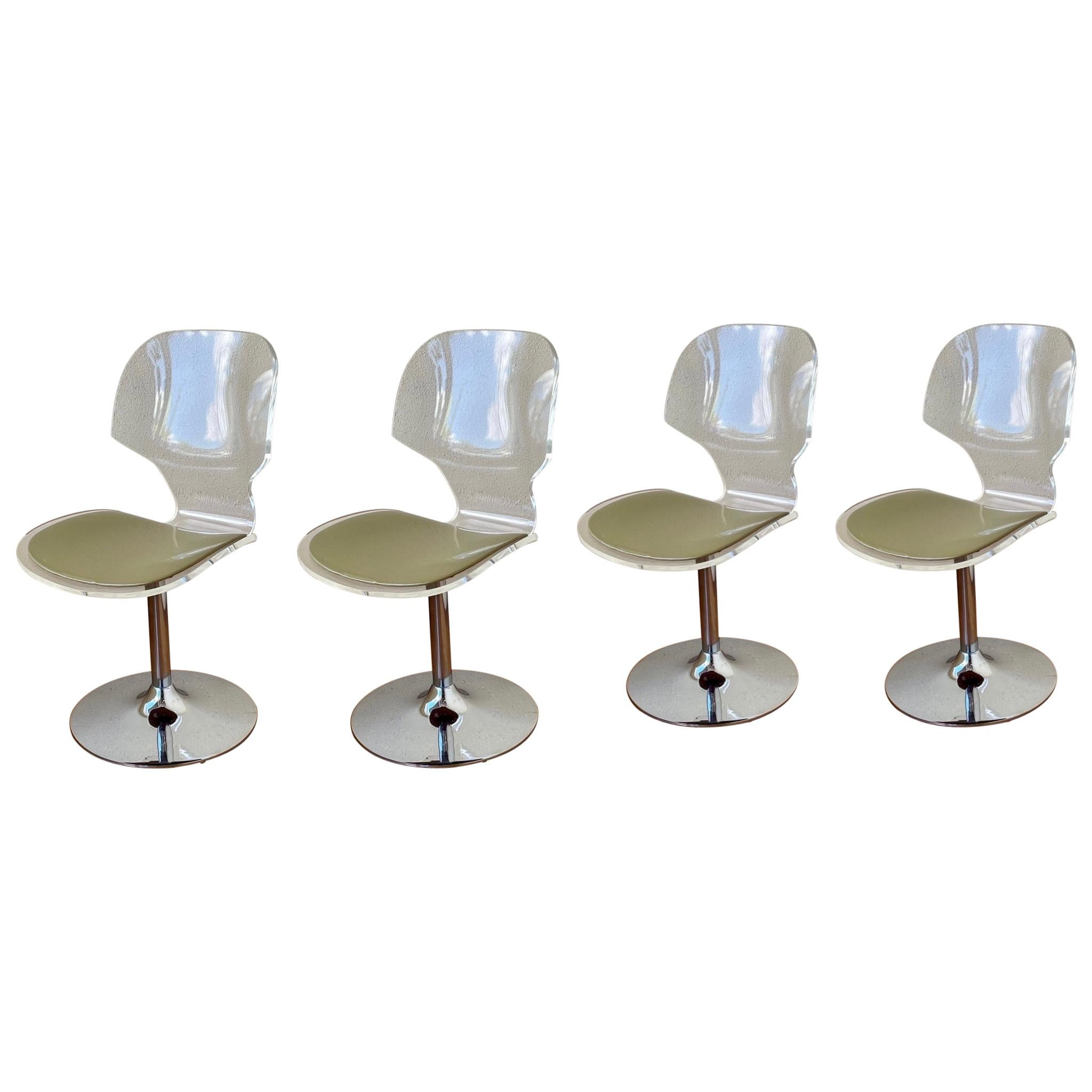 Striking Set of 4 Space Age Lucite and Chrome Swivel Chairs