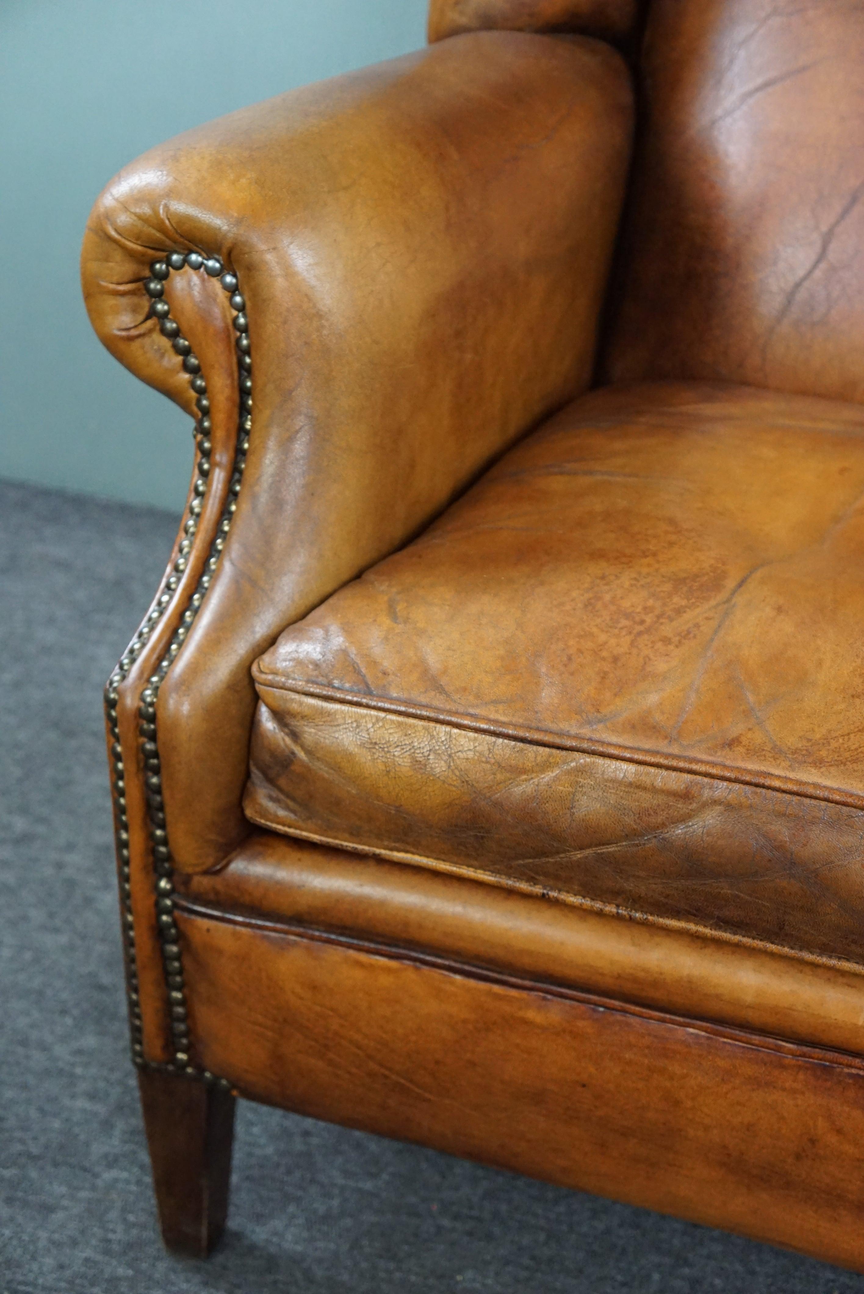 Striking sheep leather wing chair For Sale 5