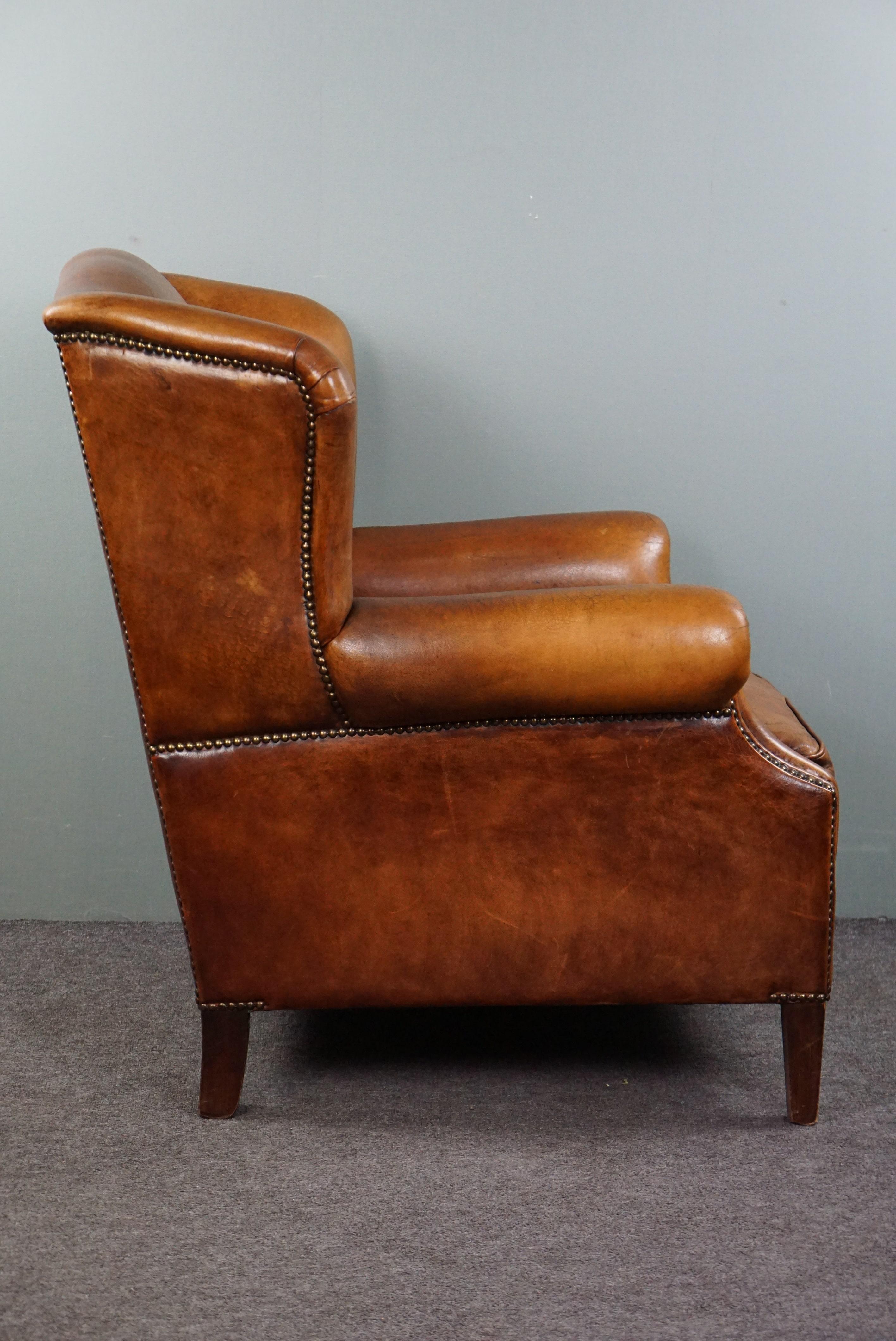 Striking sheep leather wing chair In Good Condition For Sale In Harderwijk, NL