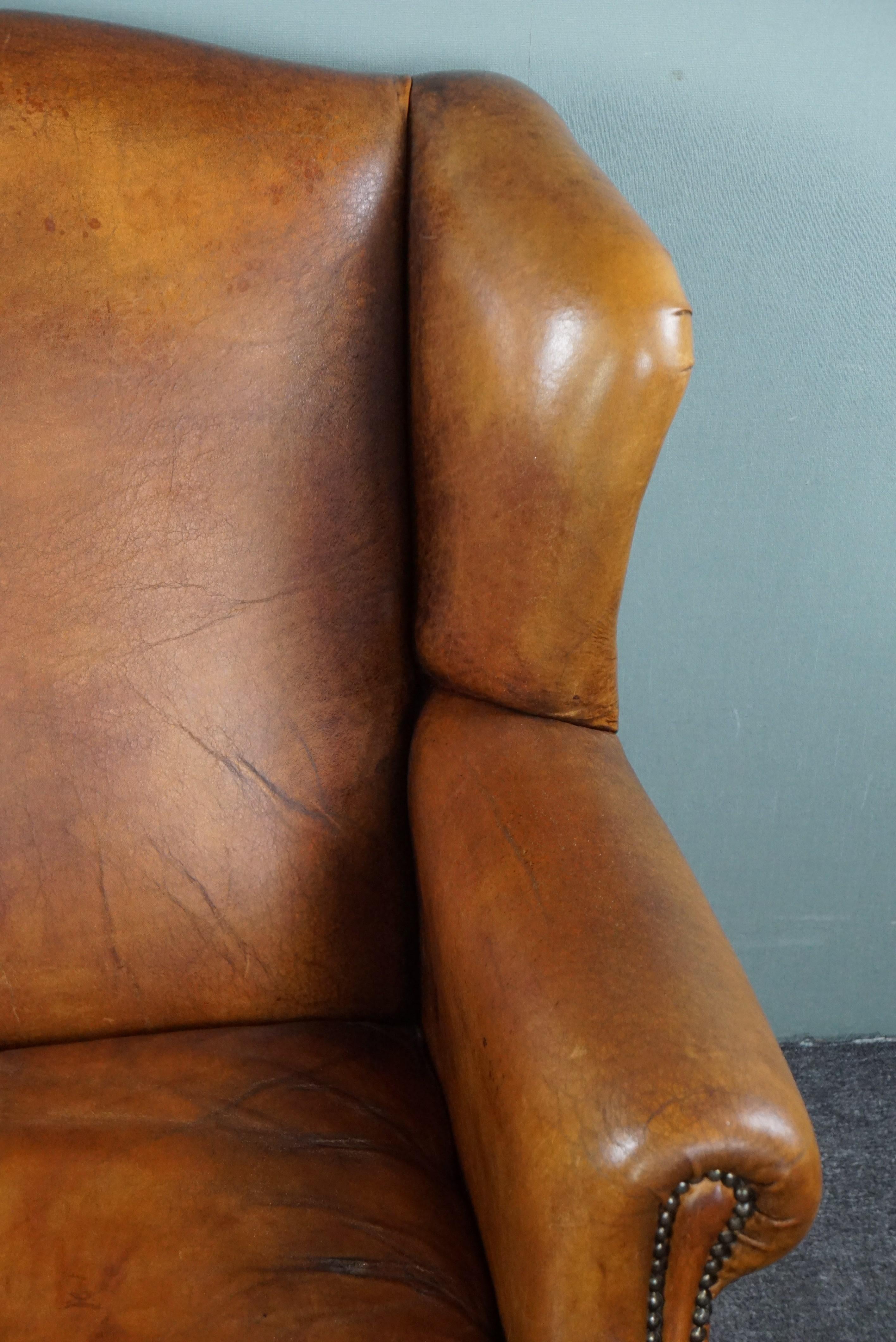 Striking sheep leather wing chair For Sale 3