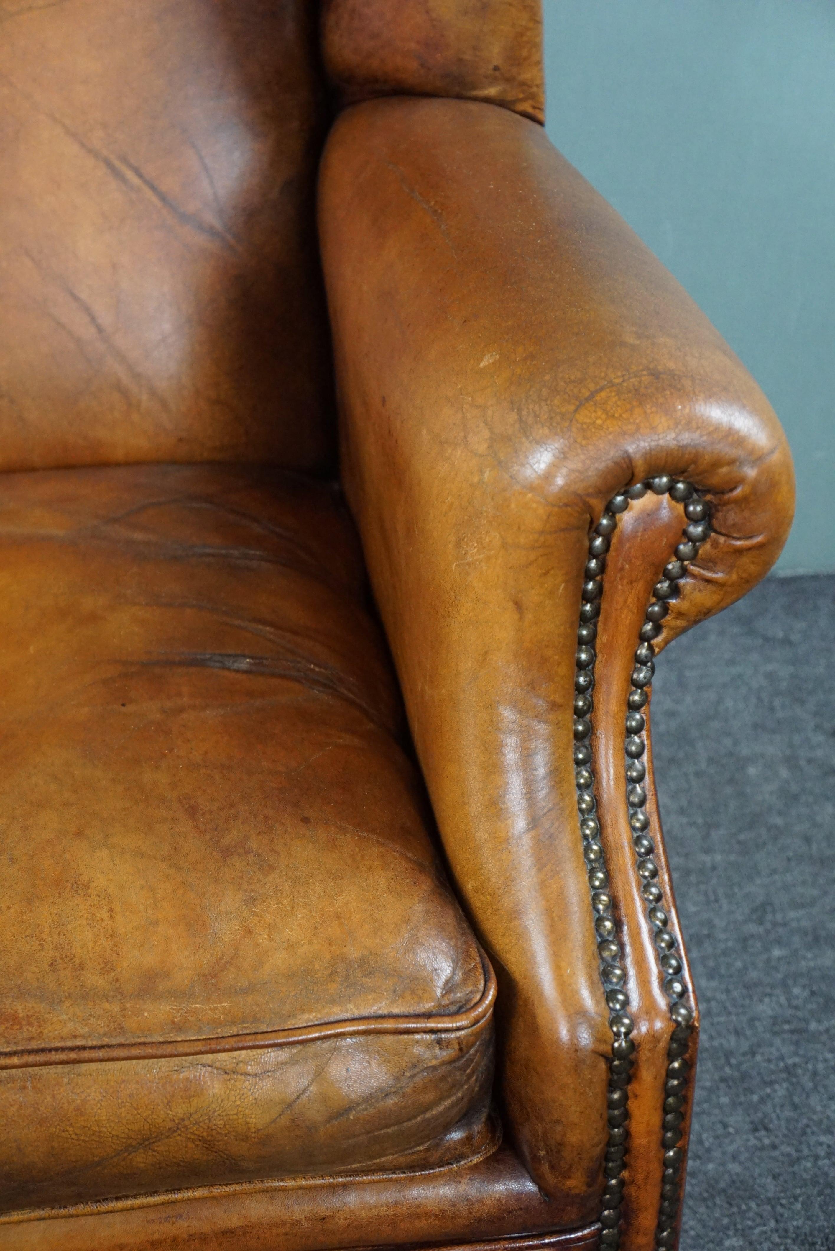Striking sheep leather wing chair For Sale 4