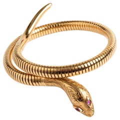 Striking Snake Bangle with Ruby Eye, 9 Carat Yellow Gold, Hallmarked 1989 UK