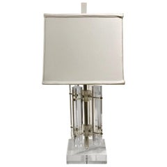 Lampada da tavolo in lucite massiccia e cromo