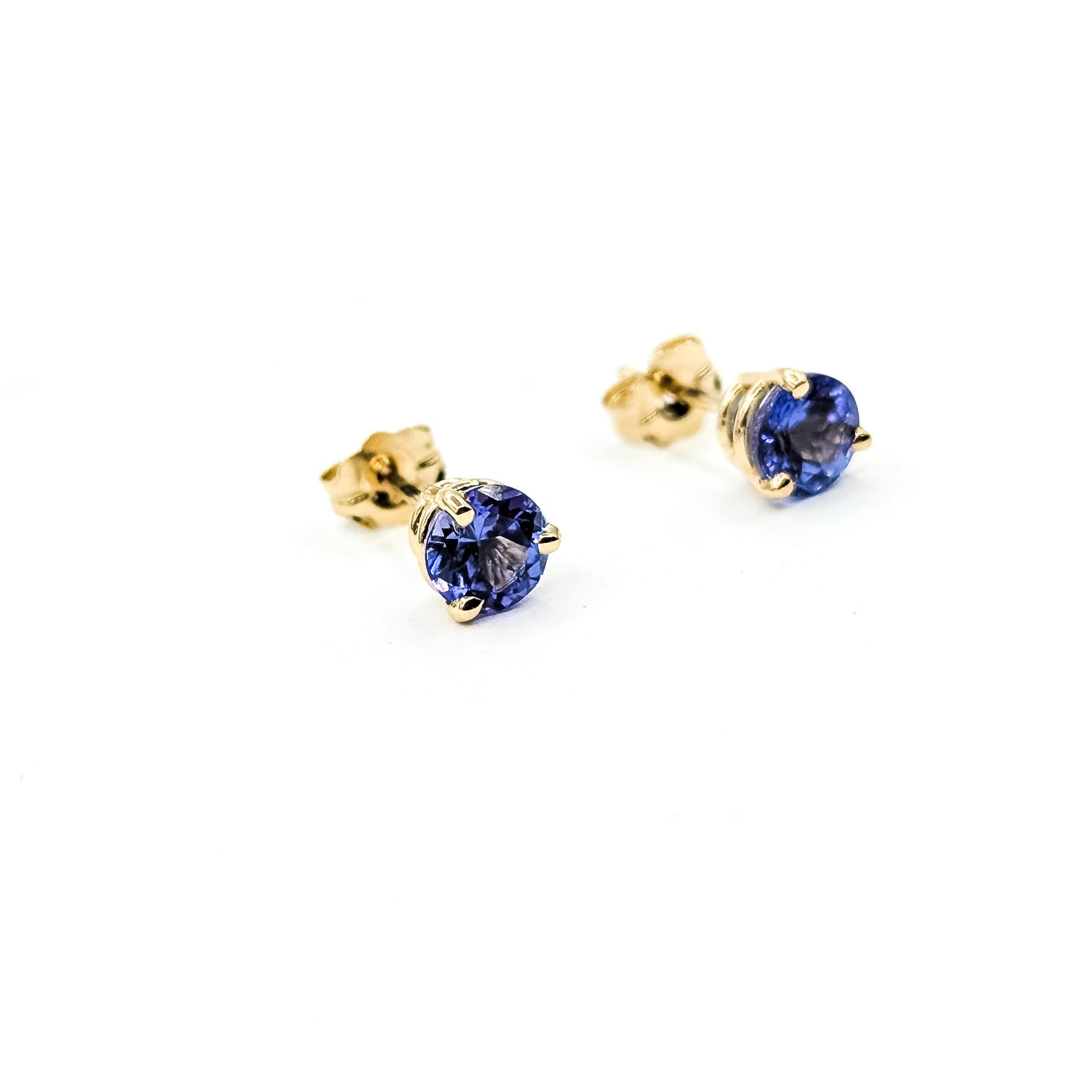 Donna Orecchini con tanzanite in oro giallo 14 ct. in vendita