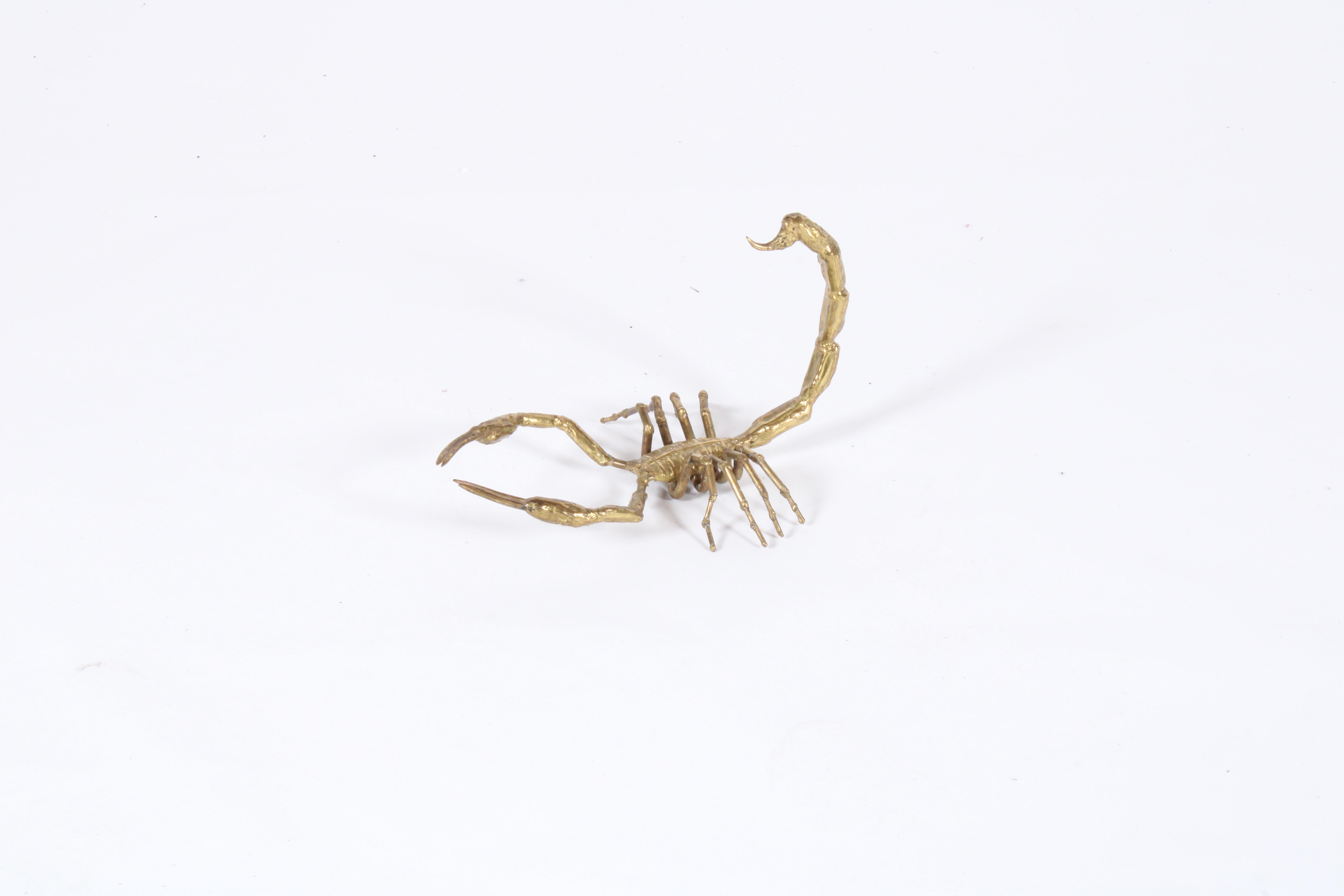 Vintage Italian brass sculpture in the form of a scorpion bearing the artists stamp underneath. A striking piece that will look amazing in any private home or commercial premises.
Italian circa 1970
35.5 x 14 x 23 cm