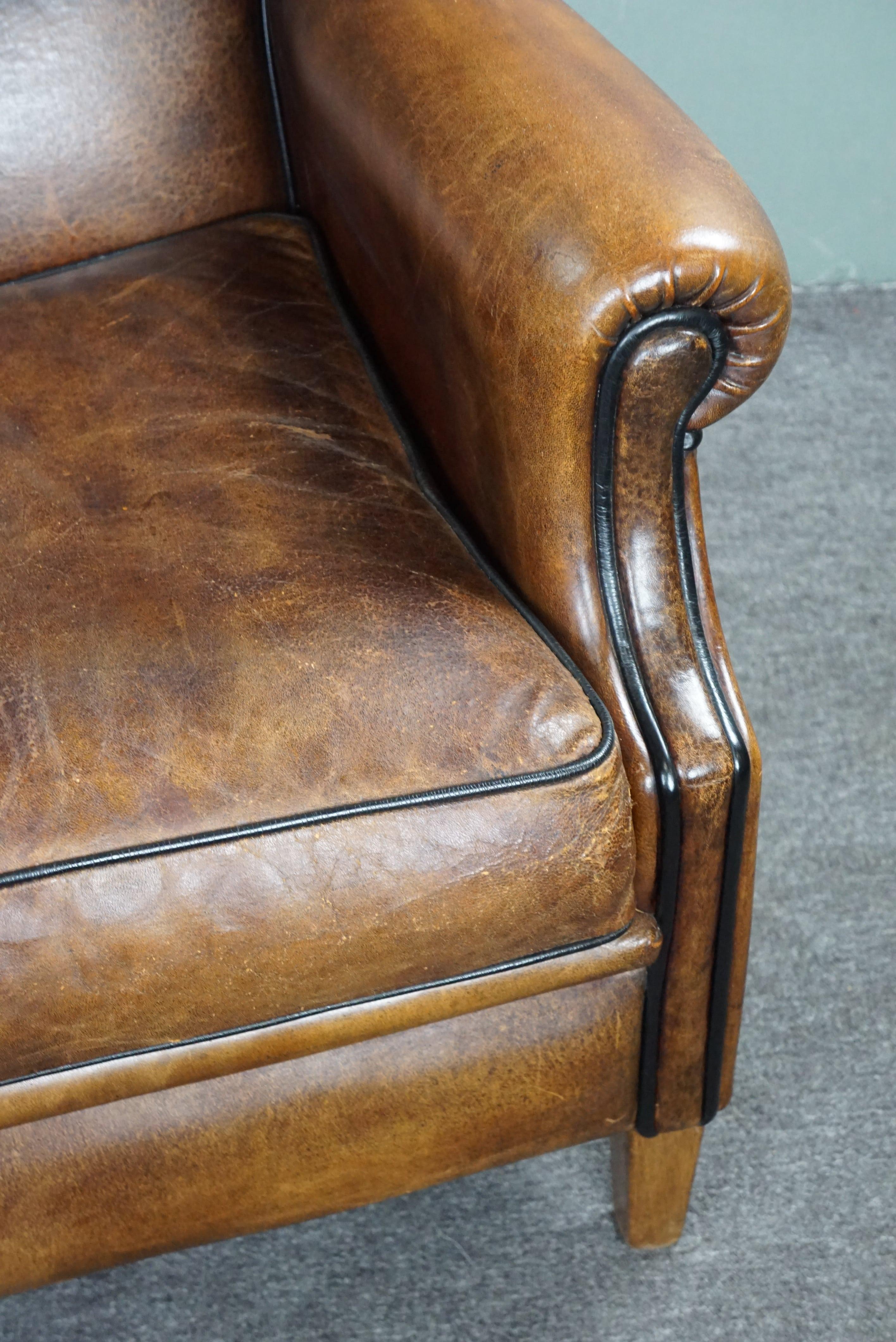 Strikingly colored sheepskin leather wing chair For Sale 5