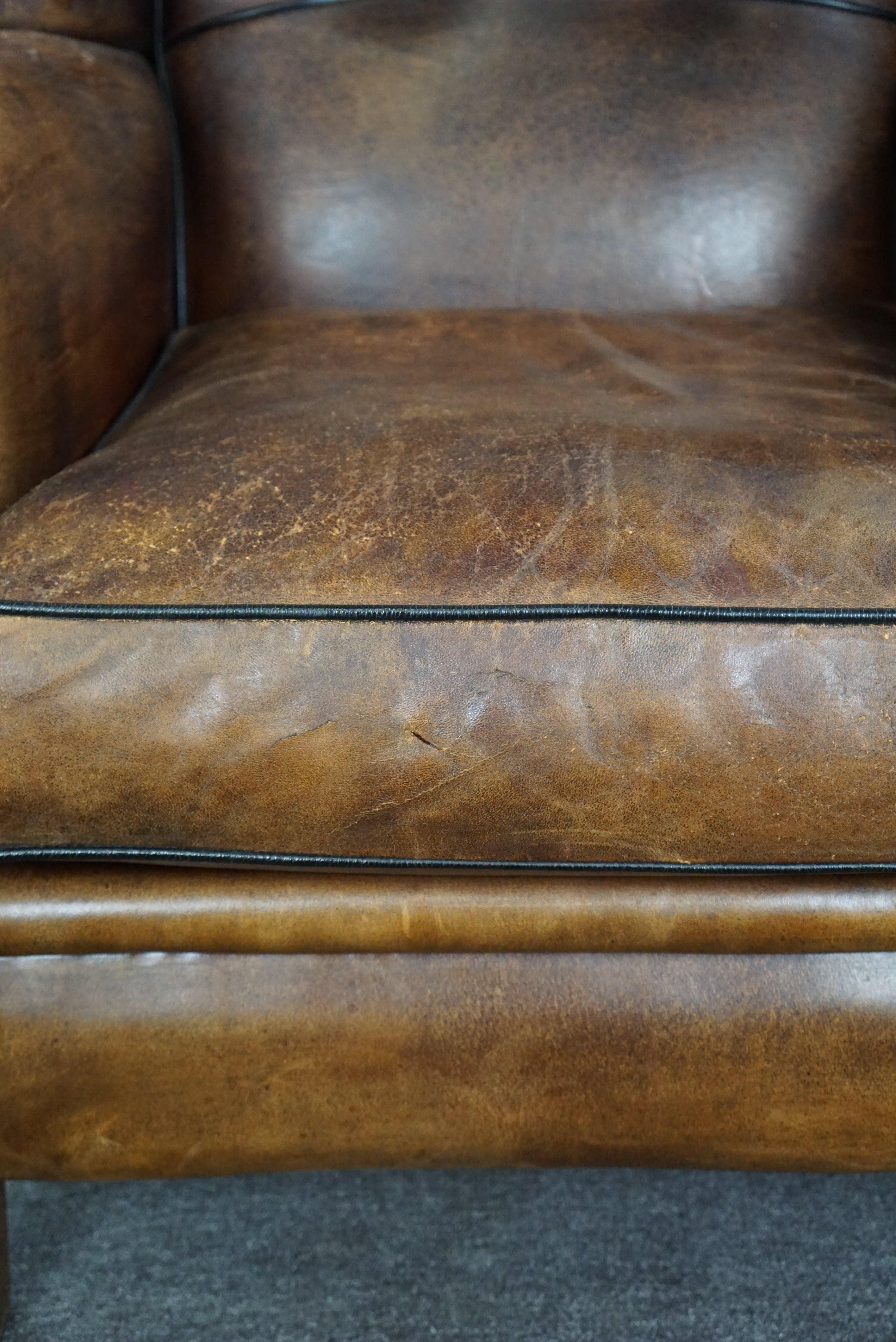 Strikingly colored sheepskin leather wing chair For Sale 6