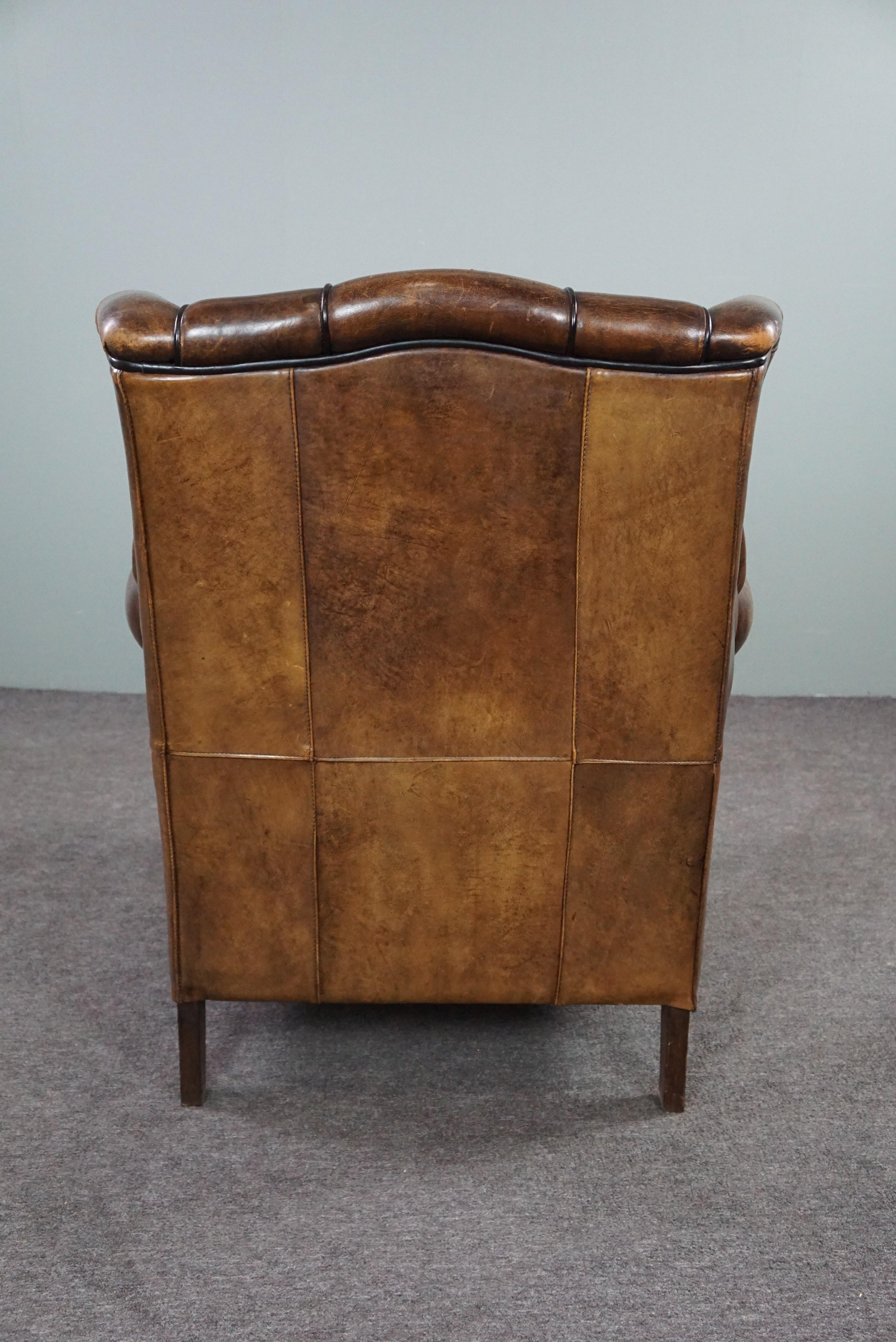 Hand-Crafted Strikingly colored sheepskin leather wing chair For Sale