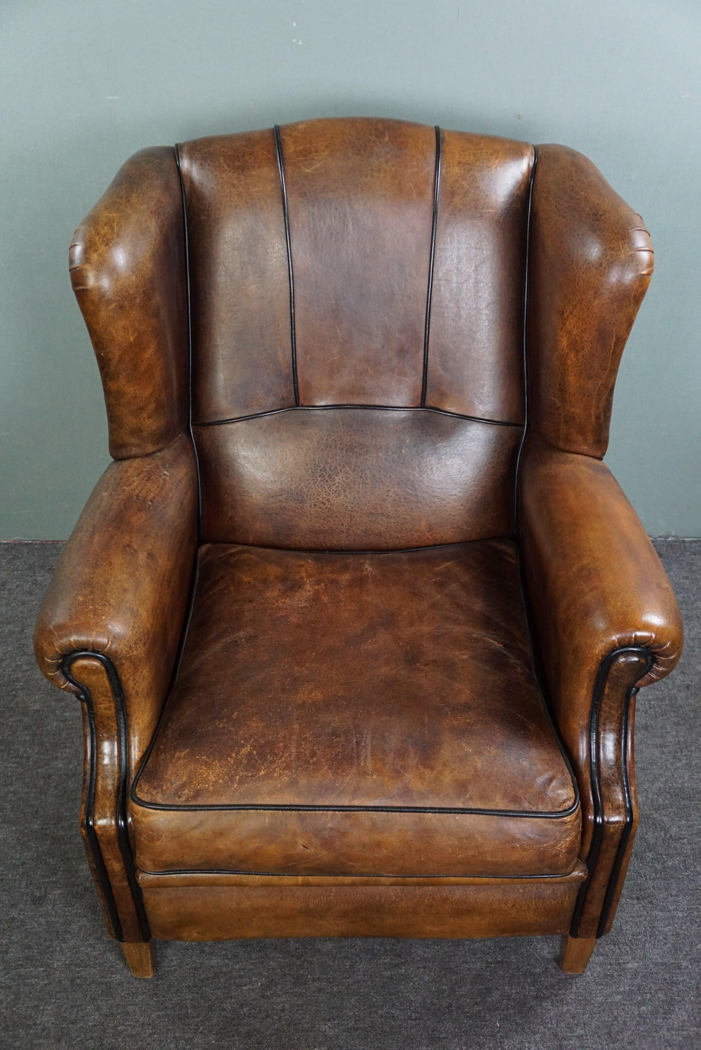 Strikingly colored sheepskin leather wing chair For Sale 1