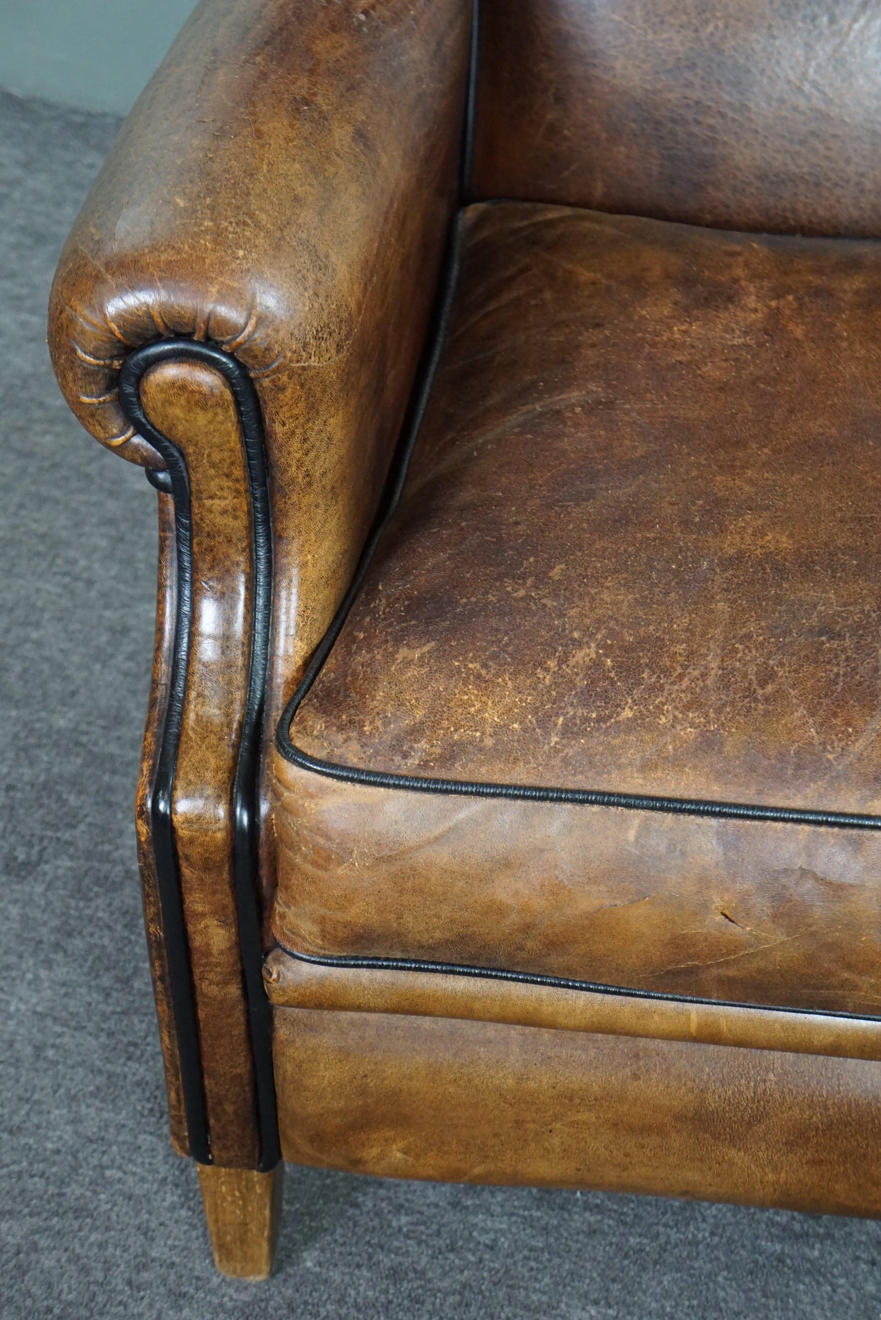 Strikingly colored sheepskin leather wing chair For Sale 2