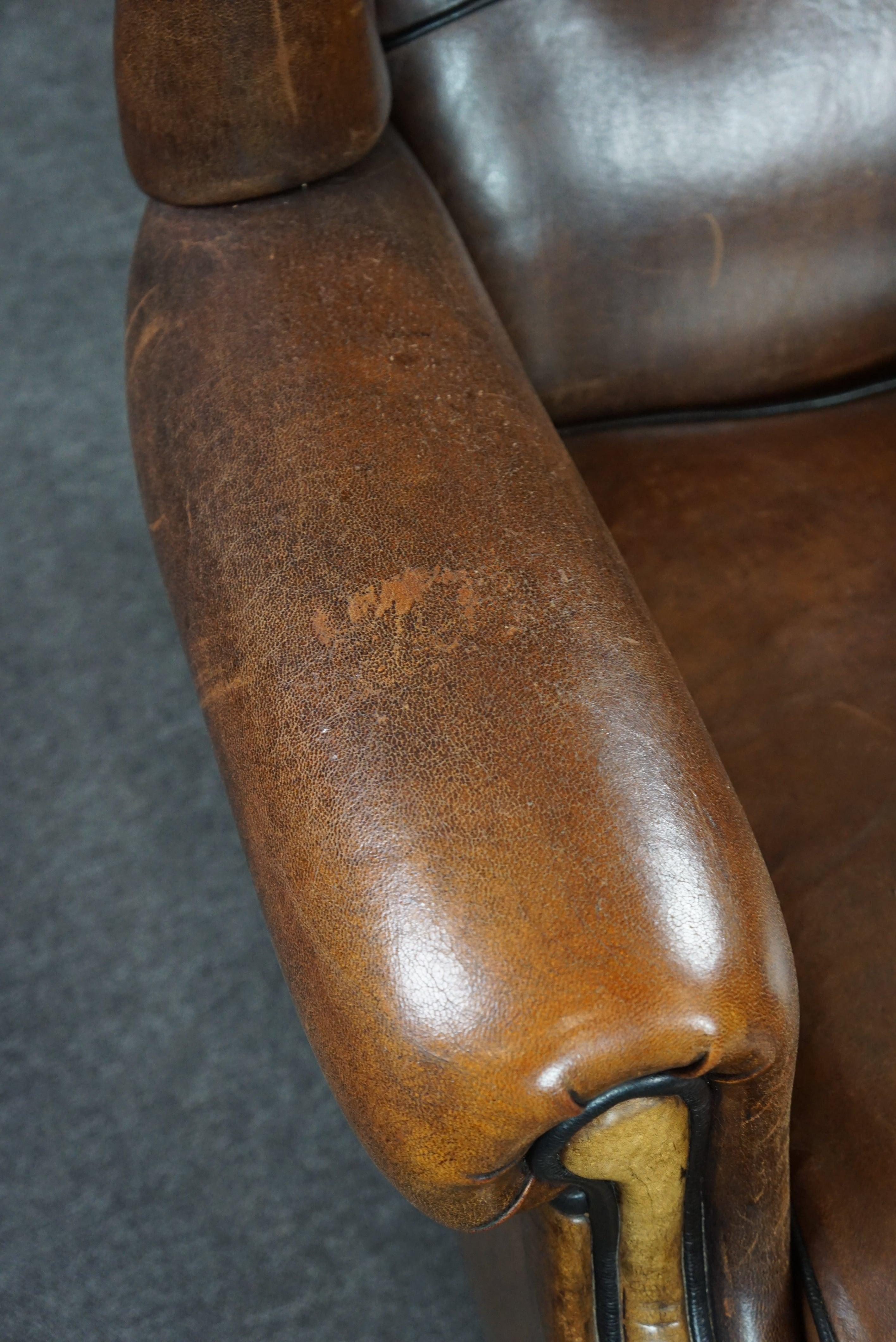 Leather Strikingly colored sheepskin leather wing chair For Sale