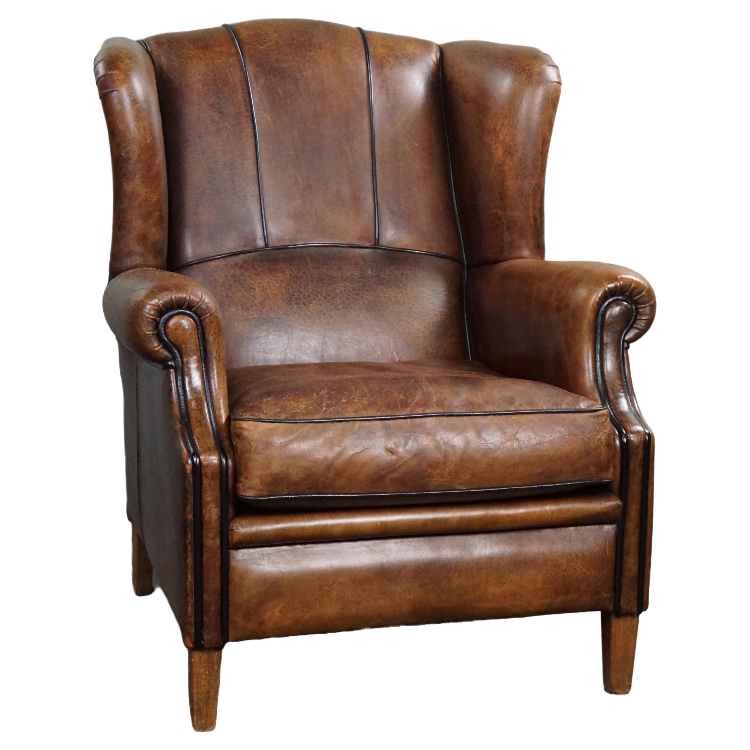 Strikingly colored sheepskin leather wing chair