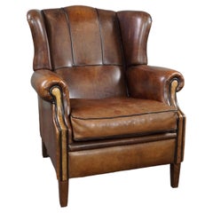 Strikingly colored sheepskin leather wing chair