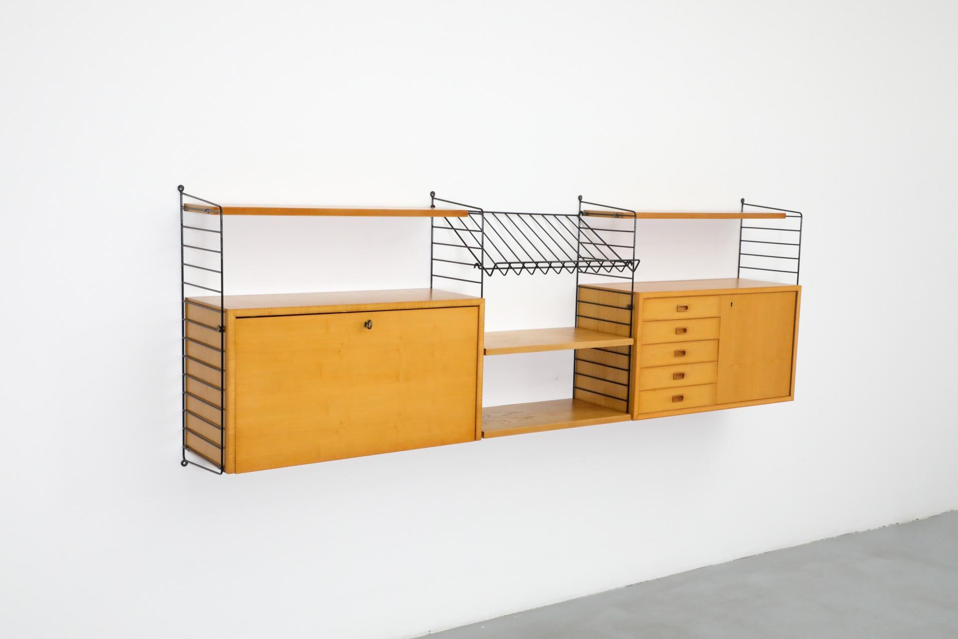 String 3 Section Oak Wall Mount Unit w/ 4 Shelves, 2 Cabinets & Magazine Rack In Good Condition For Sale In Los Angeles, CA