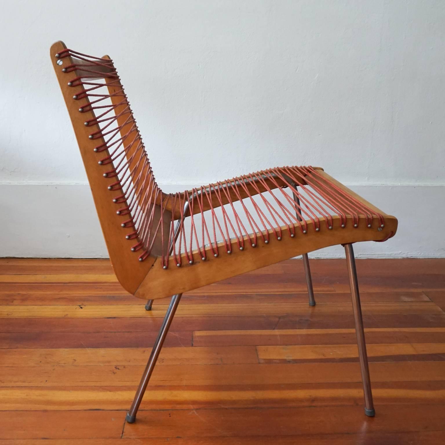 Wood and string chair by Robert J Ellenberger for Calfab Furniture Company, Los Angeles California. This design was selected for the MoMA Good Design exhibition in 1950. The Knock-down side chair, solid hardwood frame strung with cord, was shown