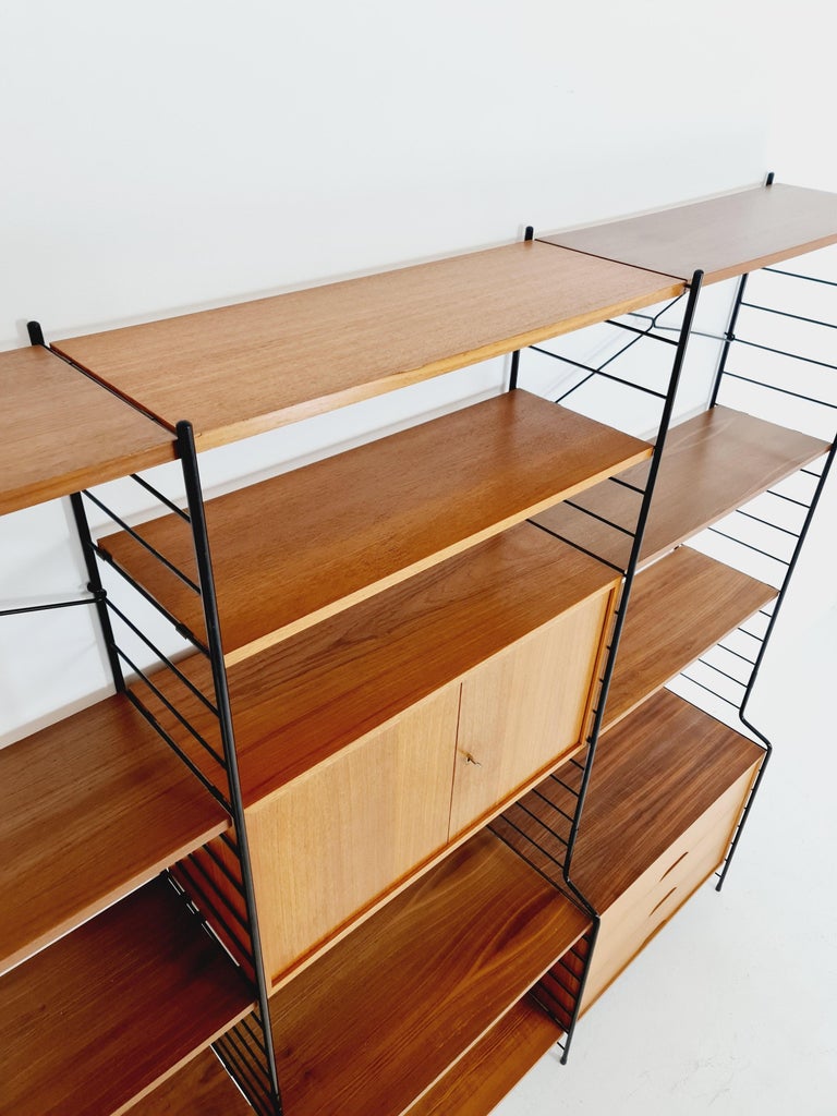 String Shelf System, Bookcase with Bar Cabinet Teak by WHB Germany, 1950s  For Sale at 1stDibs