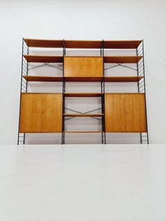 String shelf-system, librería con mueble bar de teca de WHB Alemania, años 50