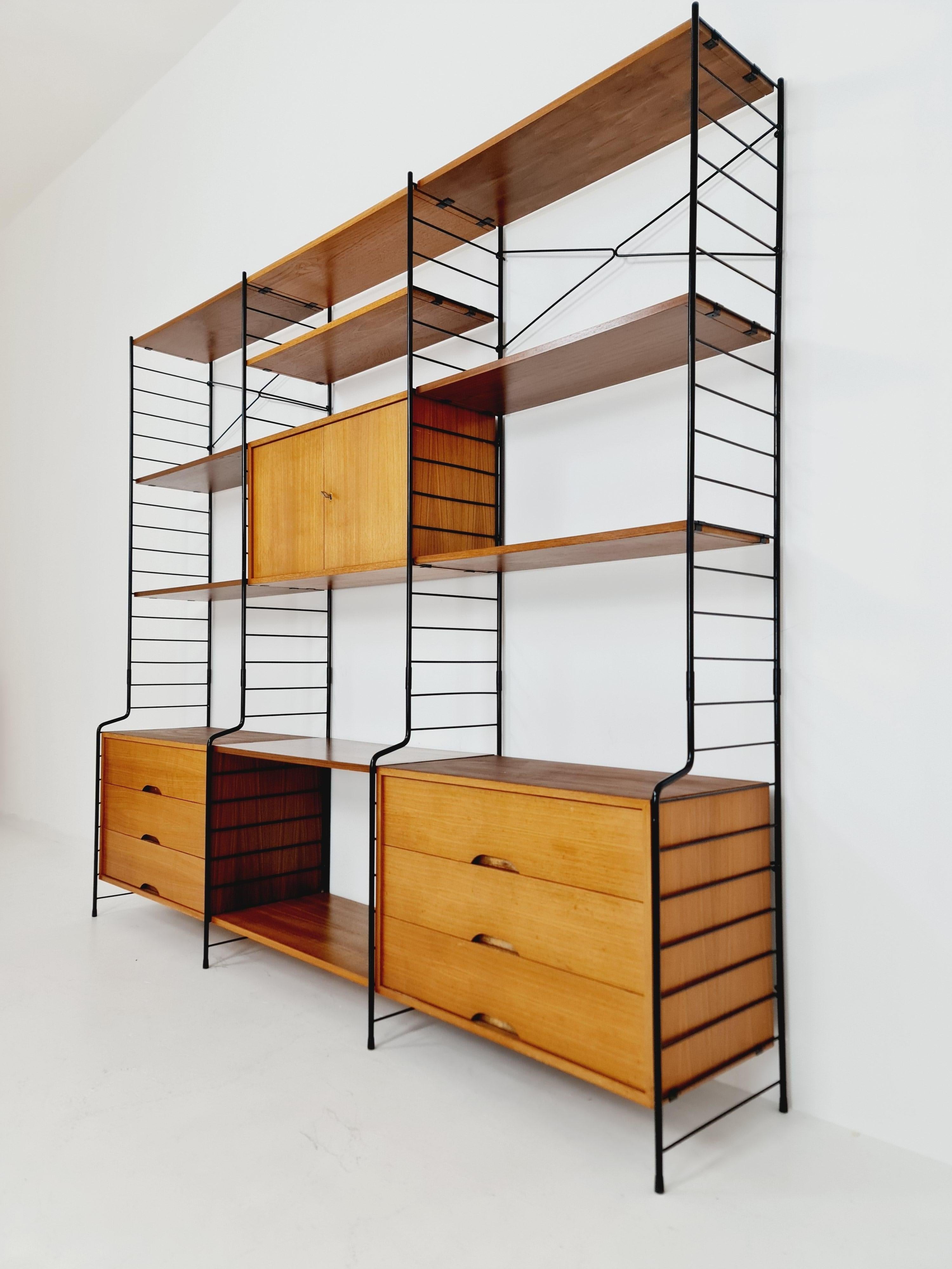 Mid-Century Modern String Shelf System, Bookcase with Bar Cabinet Teak by WHB Germany, 1950s For Sale