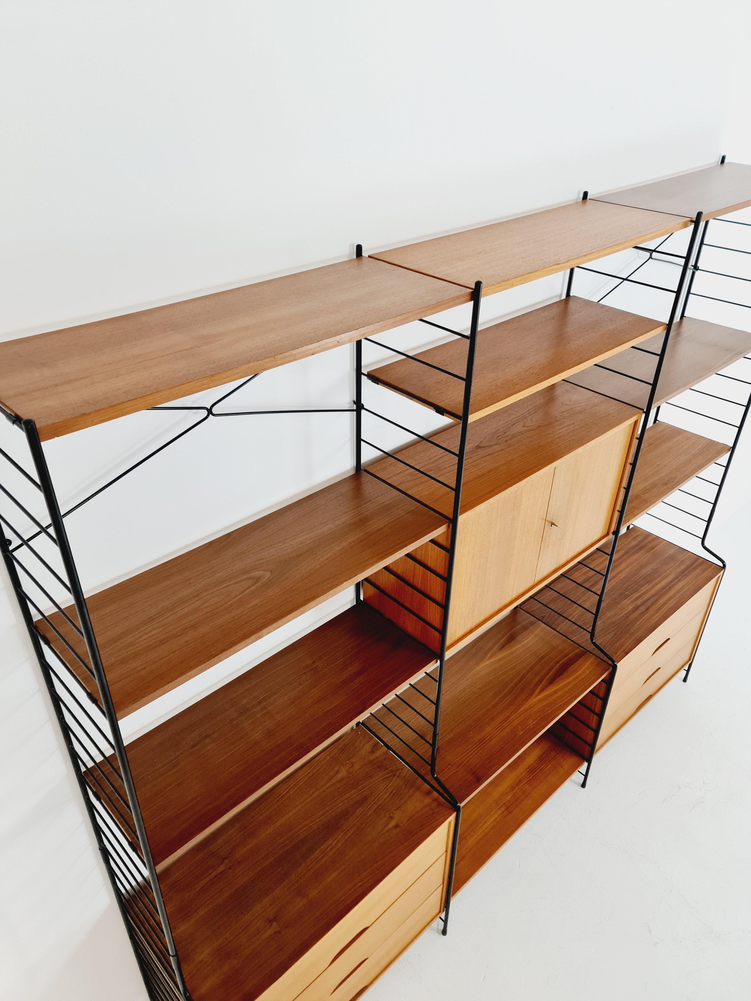 Mid-20th Century String Shelf System, Bookcase with Bar Cabinet Teak by WHB Germany, 1950s For Sale