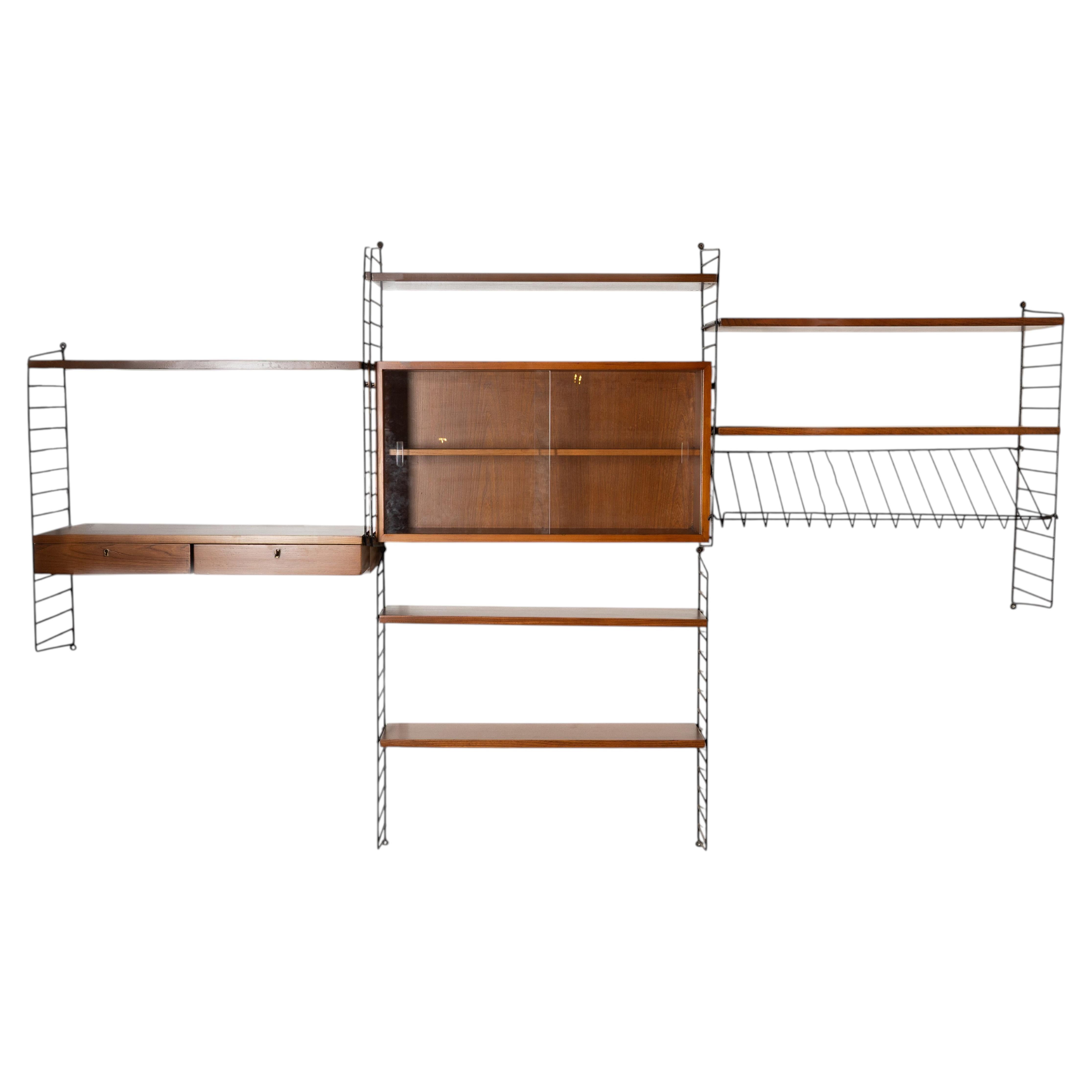 String wall bookcase, 1960 For Sale