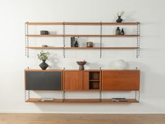 Sistema de estanterías murales "String", años 50 Nils Strinning