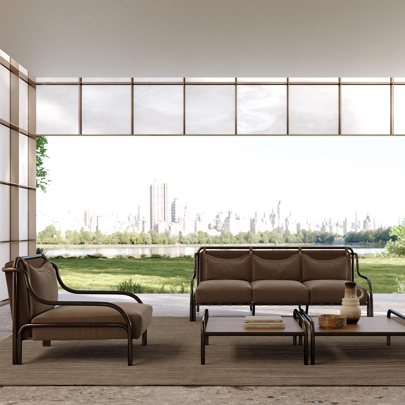 Designed to seduce with its plump volumes sealed by a combination of brown fabric and prized nautical Nubuck gray leather, this three-seater sofa is an original 1963 design by Gae Aulenti sure to ideally complement refined porches or terraces of