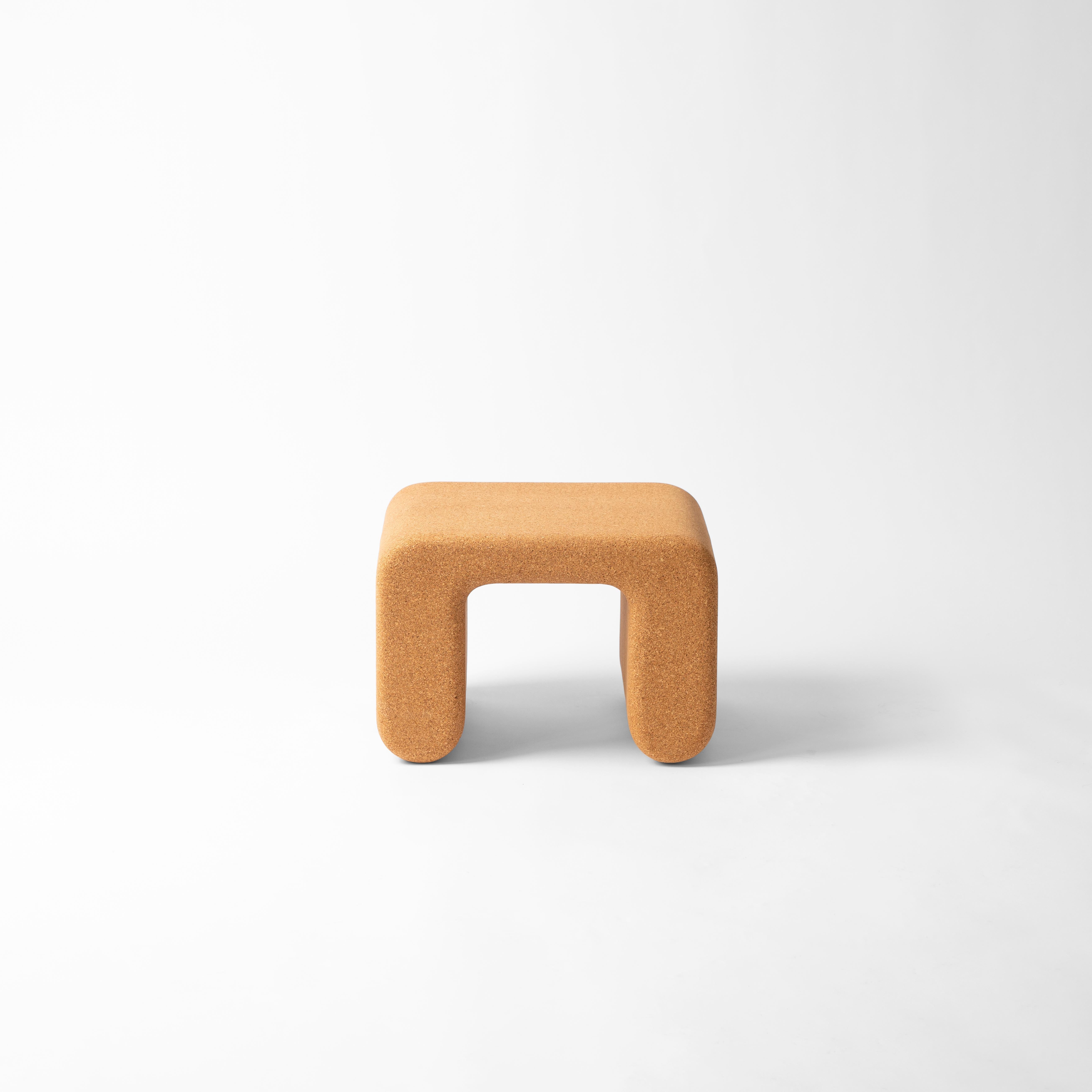 Stringer Side Table by raawii
Designed by Nicholai Wiig-Hansen
Dimensions: D 37 x W 46 x H 32 cm.
Materials: Plywood and cork.

The bench and the table are contemporary and eco-friendly pieces made entirely of cork. Smooth lines and minimalist