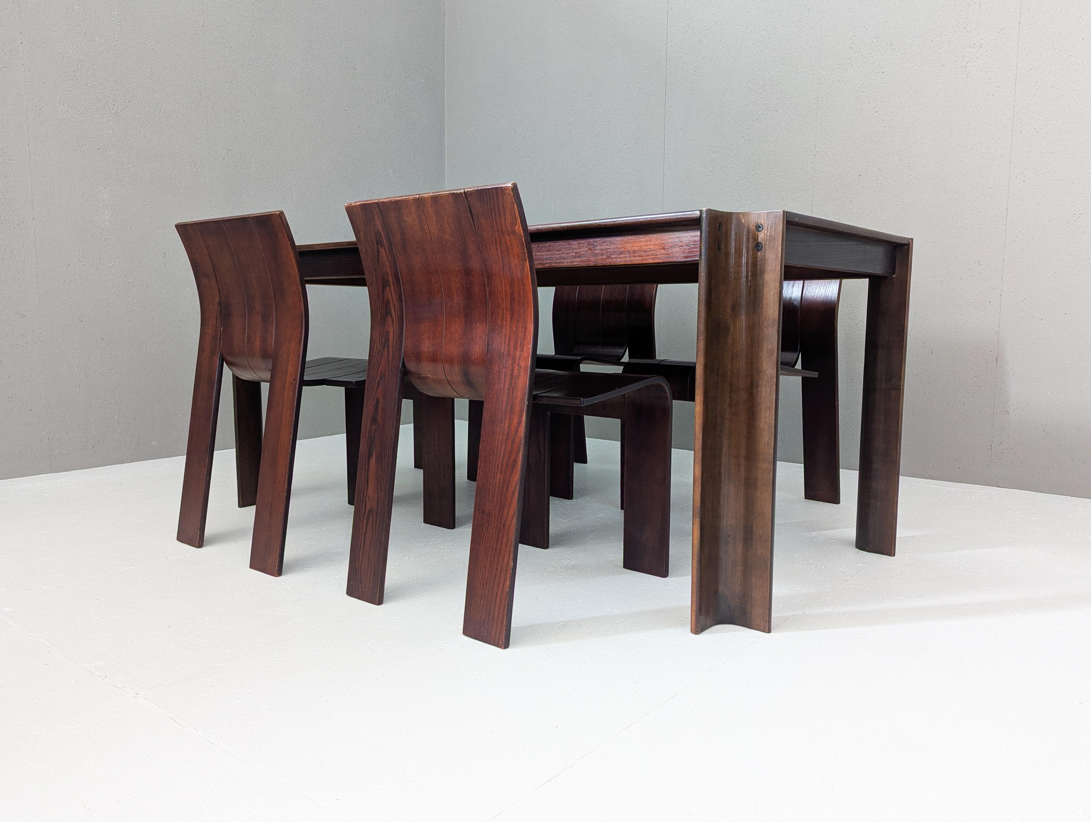 Designed by Gijs Bakker in the early 1970s for Dutch manufacturer Castelijn, the “Strip” dining set is an iconic expression of radical minimalism and postmodern sculptural form. Comprising a dining table and four matching chairs, the set is made