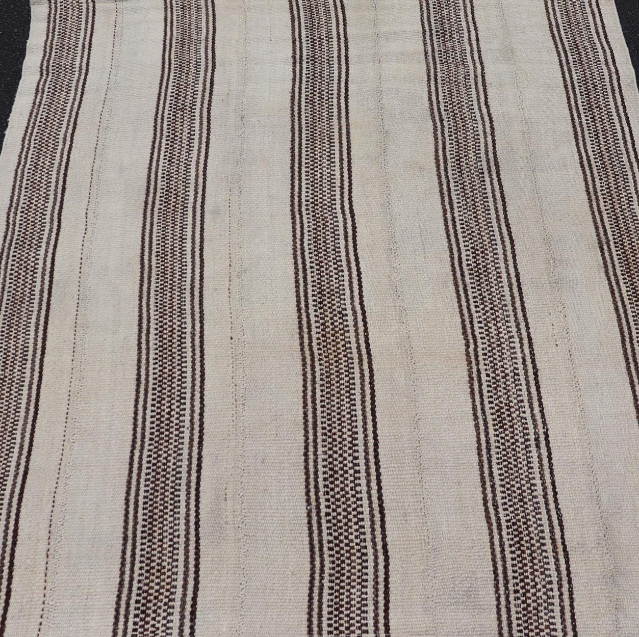 Stripe Design Turkish Vintage Flat-Weave Rug in Brown and Ivory. Keivan Woven Arts / rug EN-178786, country of origin / type: Turkey / Kilim, circa 1950
Measures: 4'5 x 5'1 
Woven during the early-20th century in Turkey, this Kilim is decorated with