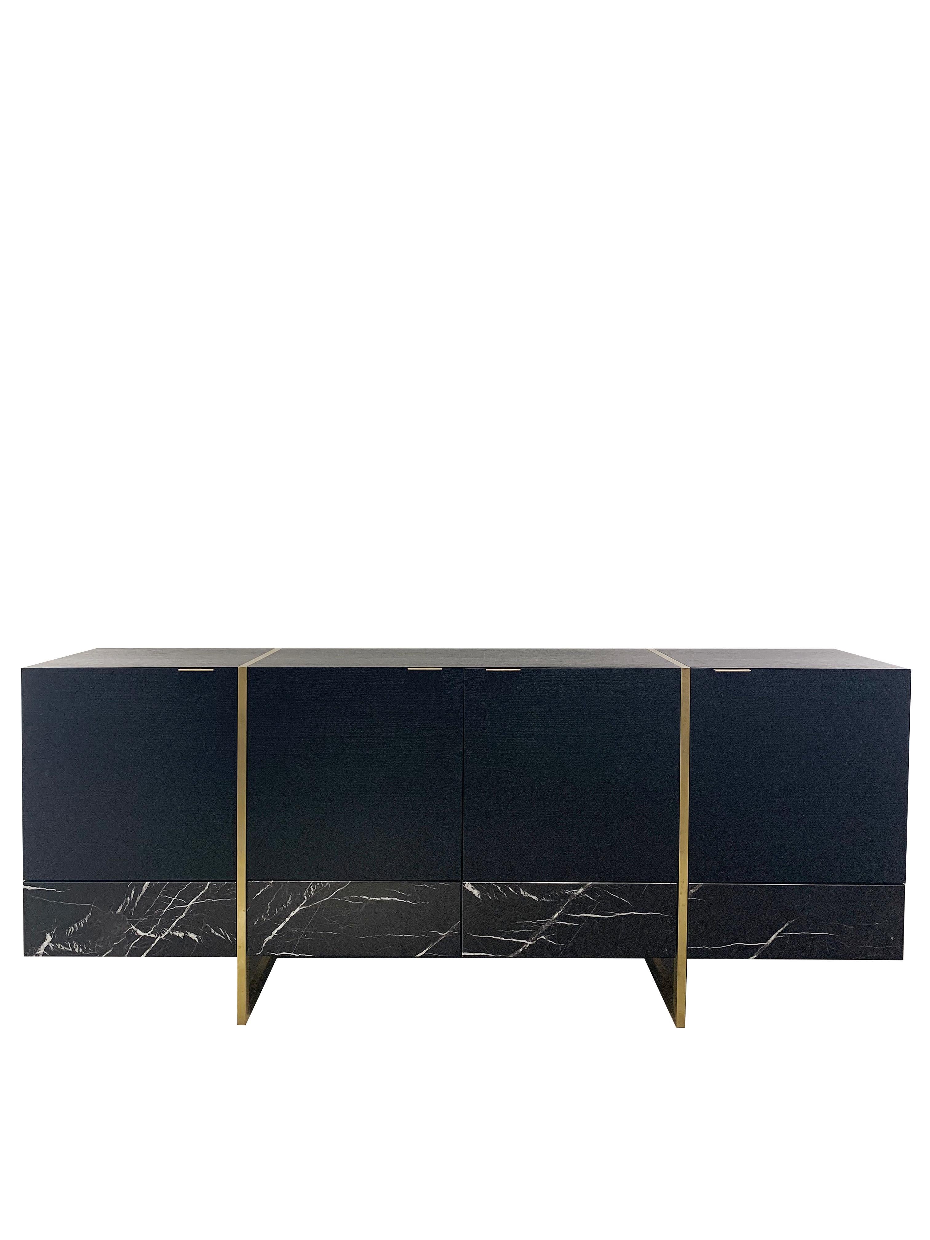 The stripe sideboard is the result of an exploration in combining marble and wood. Also, the slim handles and legs are natural brass.