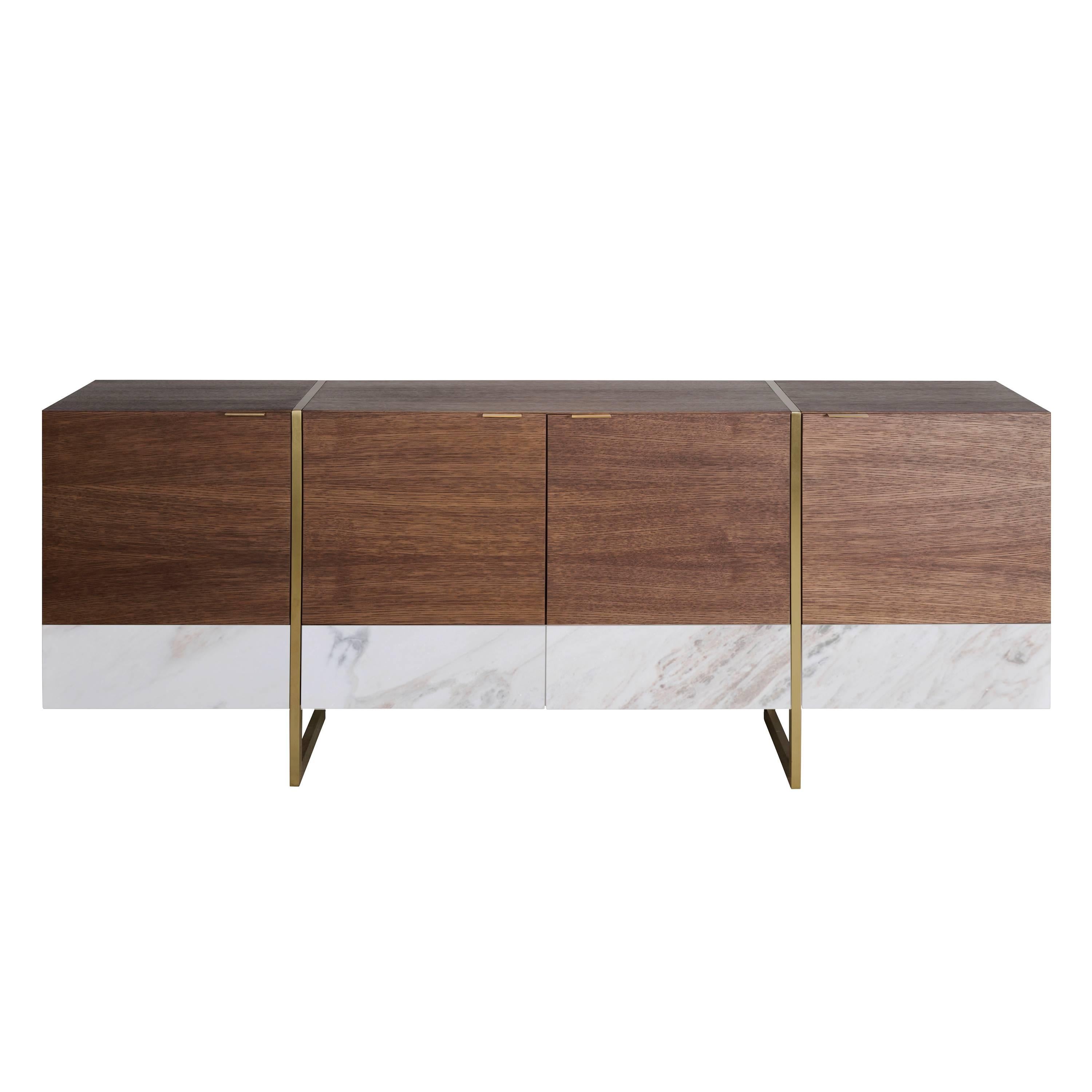 The stripe sideboard is the result of an exploration in combining marble and wood. Also, the slim handles and legs are natural brass.