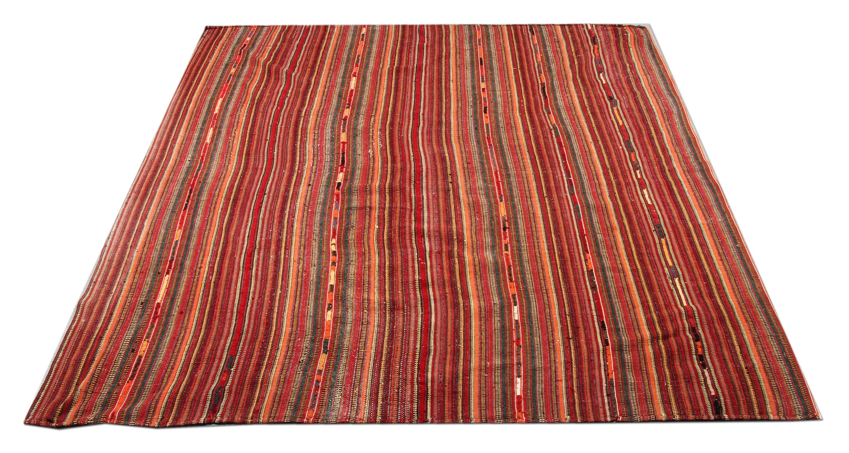 Red, ivory orange and black make up the main colors in this elegant Jajim textile. Woven by hand with a simple striped design. Both the color and design is sure to instantly uplift any home interior. Constructed with fine, hand-spun wool which has