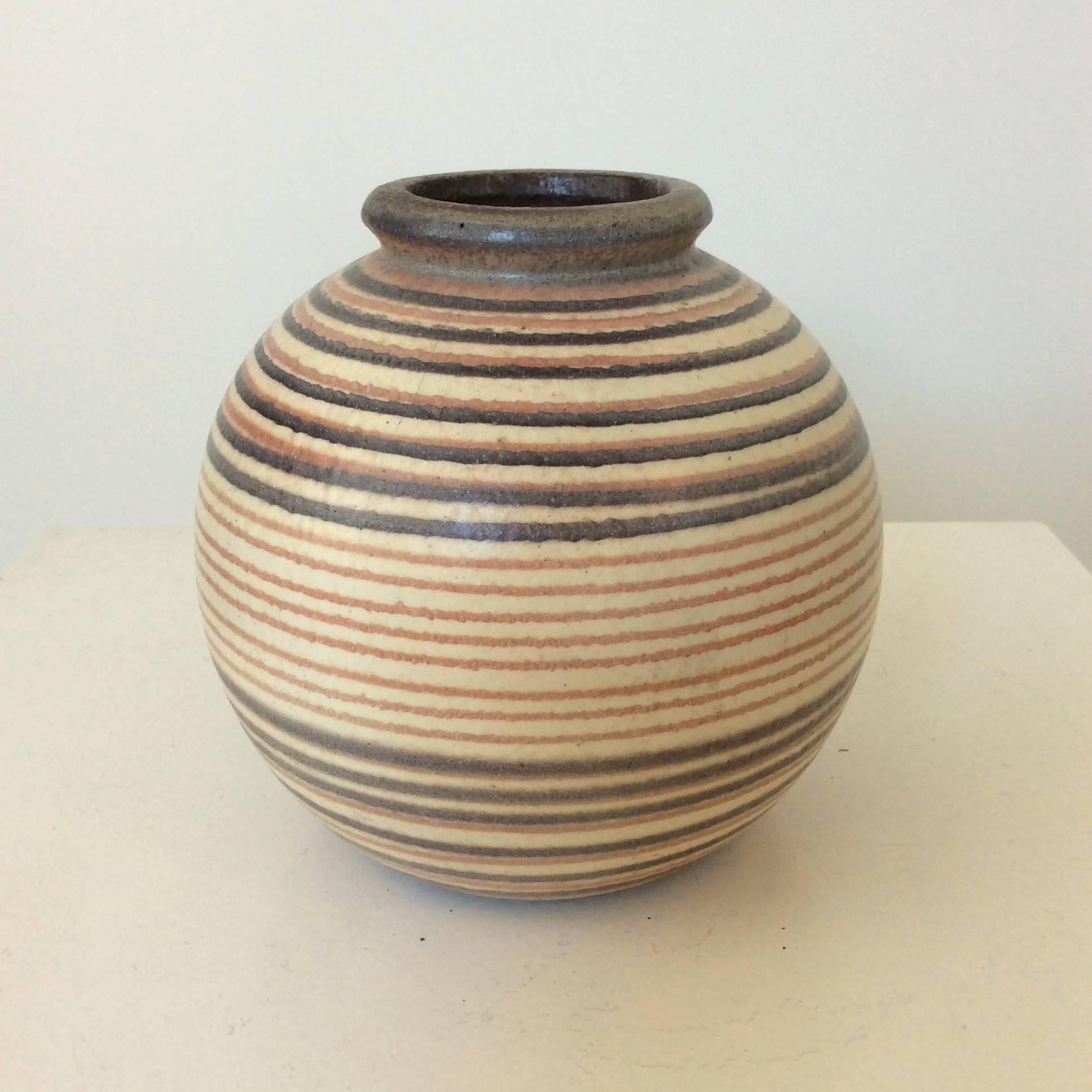 Nice striped ball vase, circa 1930. Bauhaus school.
Dimensions: 19 cm height, diameter 19 cm.
Good original condition. 
All purchases are covered by our Buyer Protection Guarantee.
This item can be returned within 7 days of delivery.
We ship