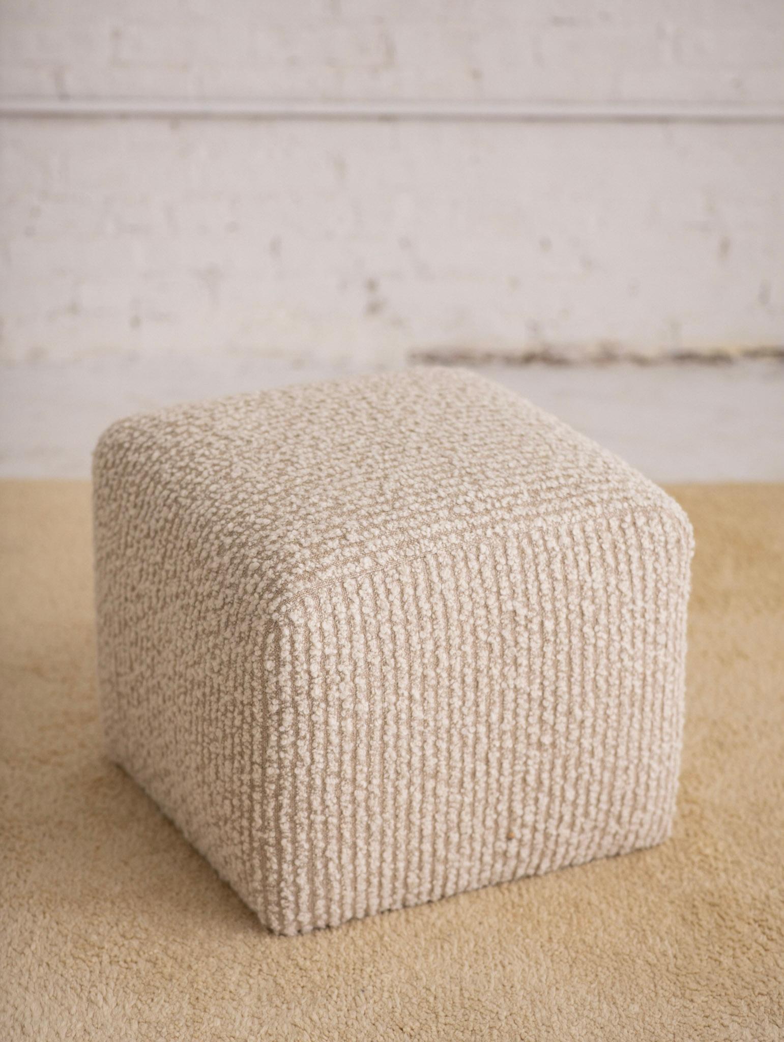 Cube ottoman newly reupholstered in a high quality, high pile wool boucle. Pair available, sold seperately.