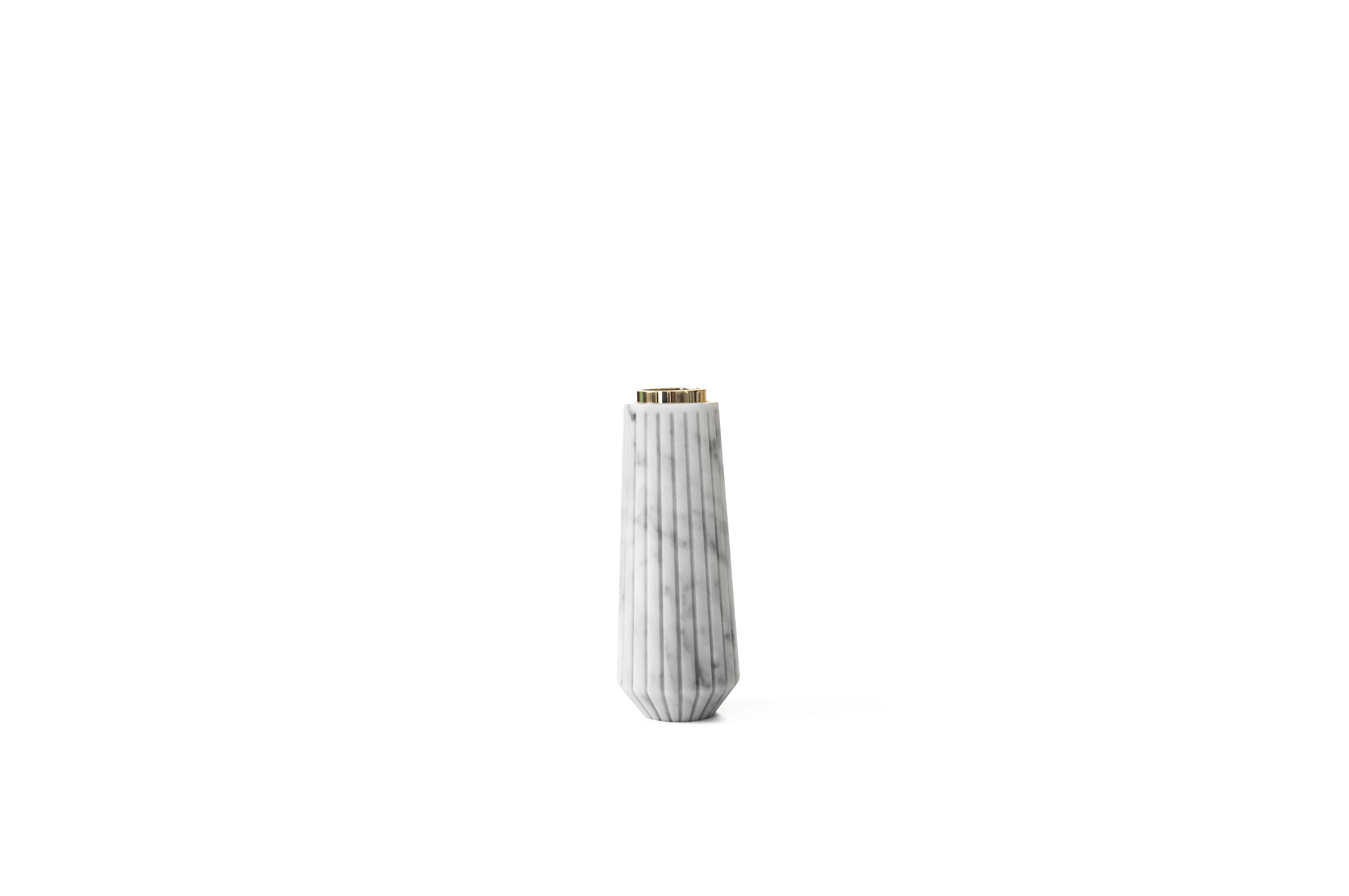 Striped candle holder in white Carrara marble and small or big brass.

Each piece is in a way unique (every marble block is different in veins and shades) and handmade by Italian artisans specialized over generations in processing marble. Slight